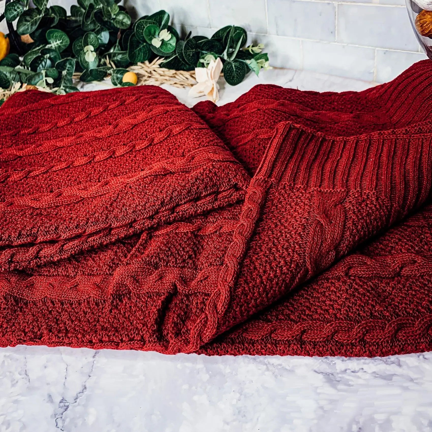 Cozy red cable knit blanket for farmhouse and cottage style home decor