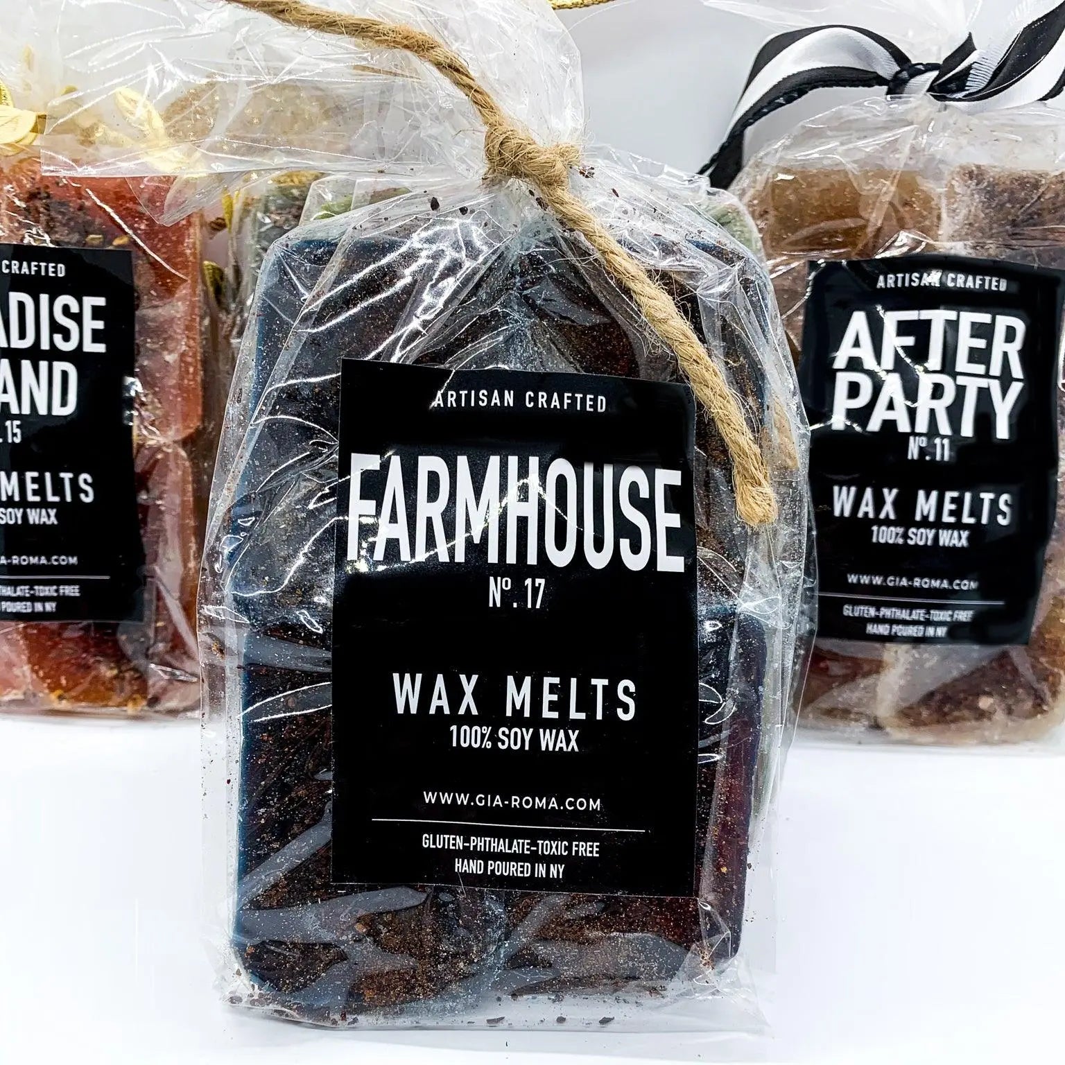 Packaged wax melts with 'Farmhouse' label on a white background