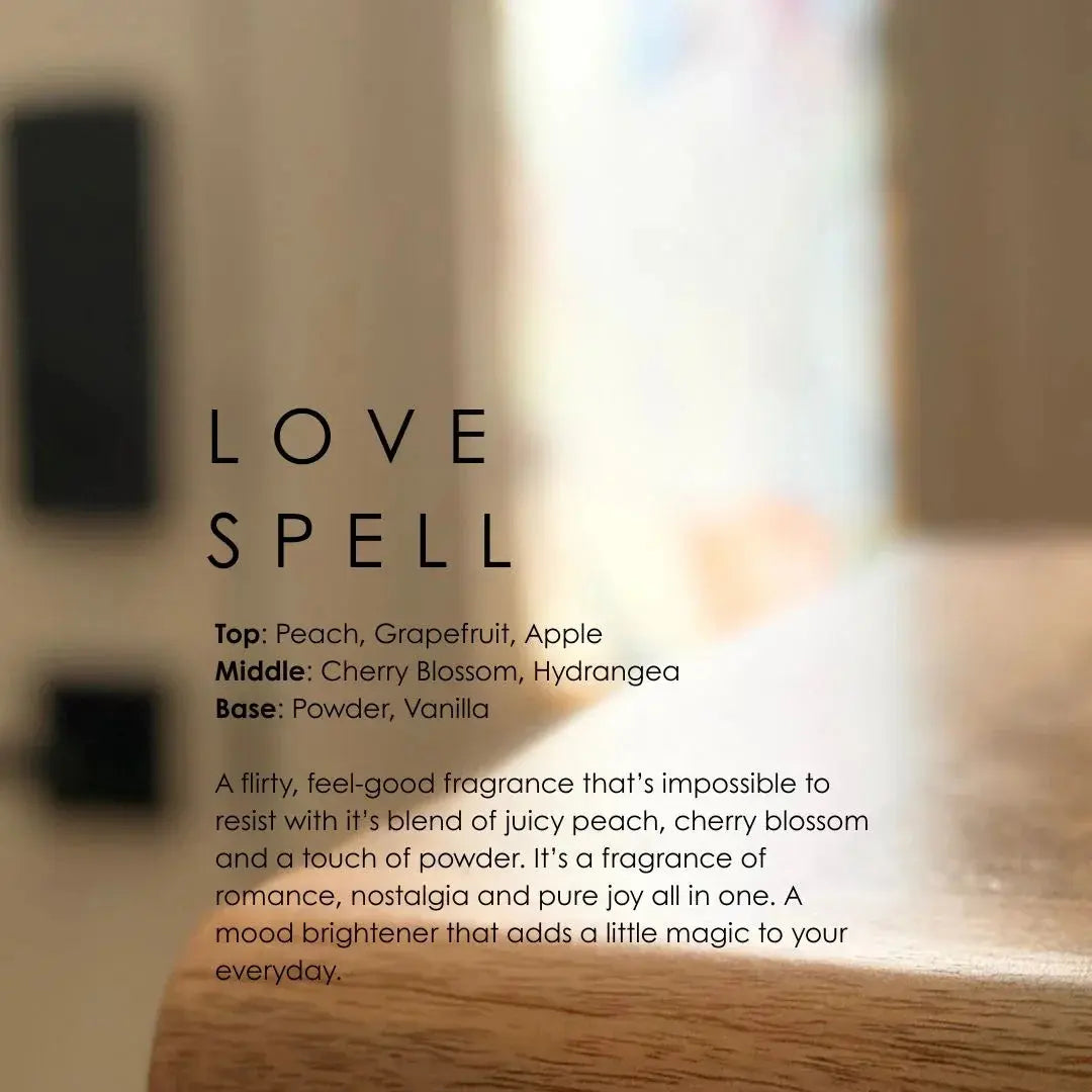 Love Spell fragrance notes: peach, cherry blossom, vanilla — cozy home scent for mood brightening