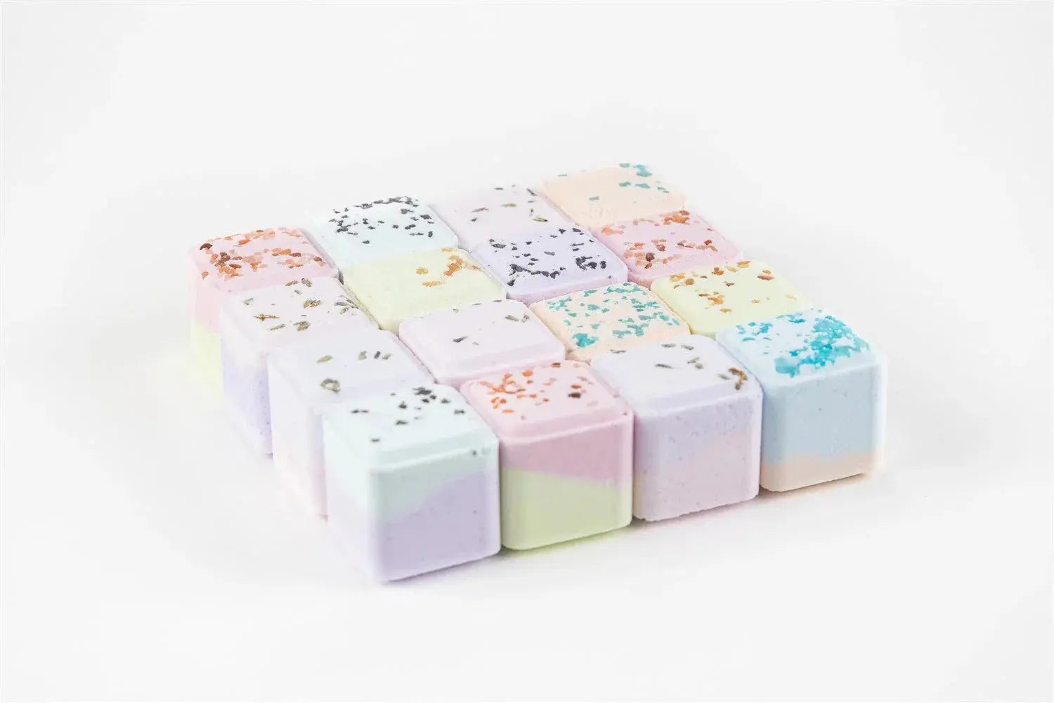 Pastel bath bombs with dried flowers, cozy farmhouse bath essentials for relaxing self-care