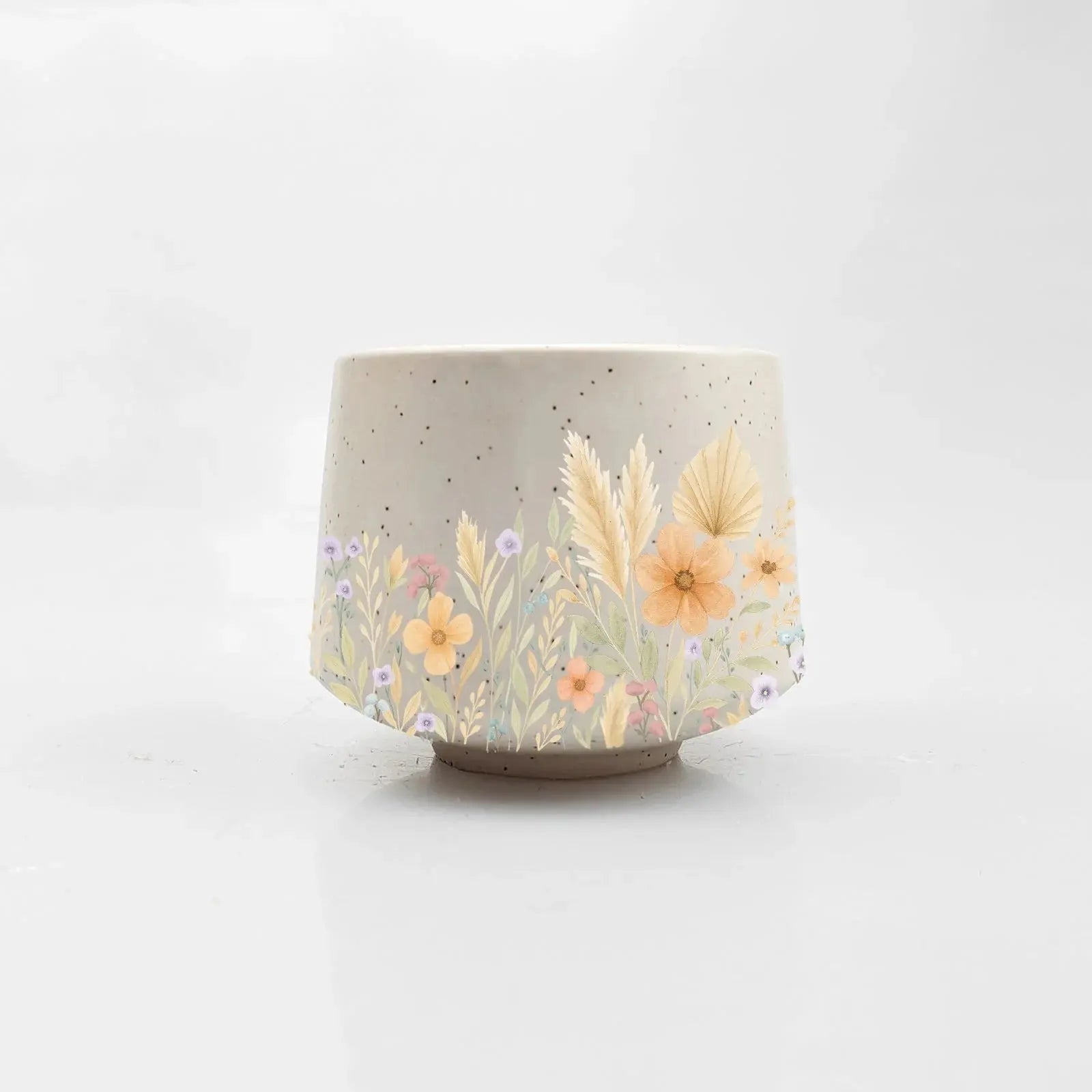 Handmade ceramic planter with wildflower and wheat design, cozy farmhouse decor