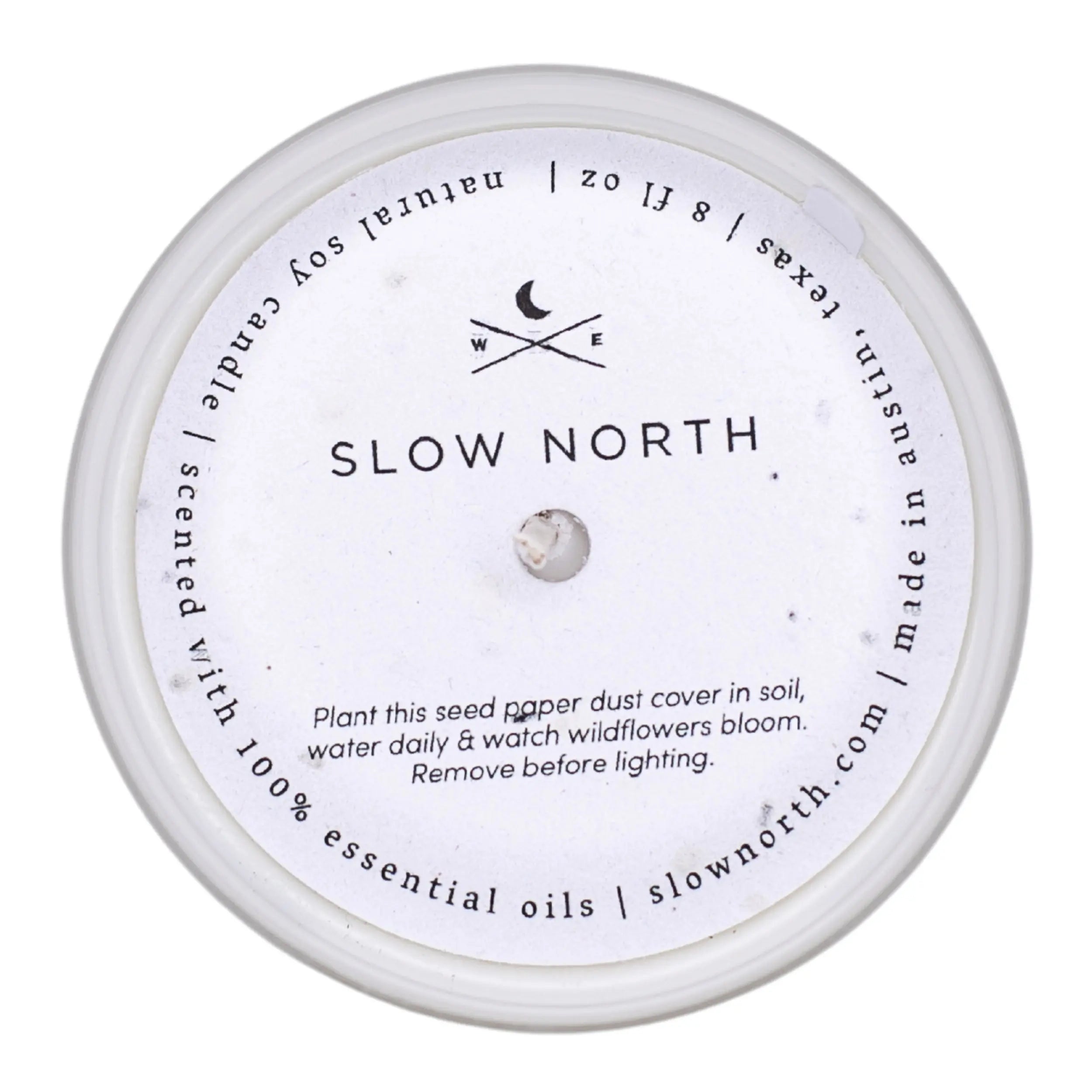 Round container with 'Slow North' branding and text on a white background