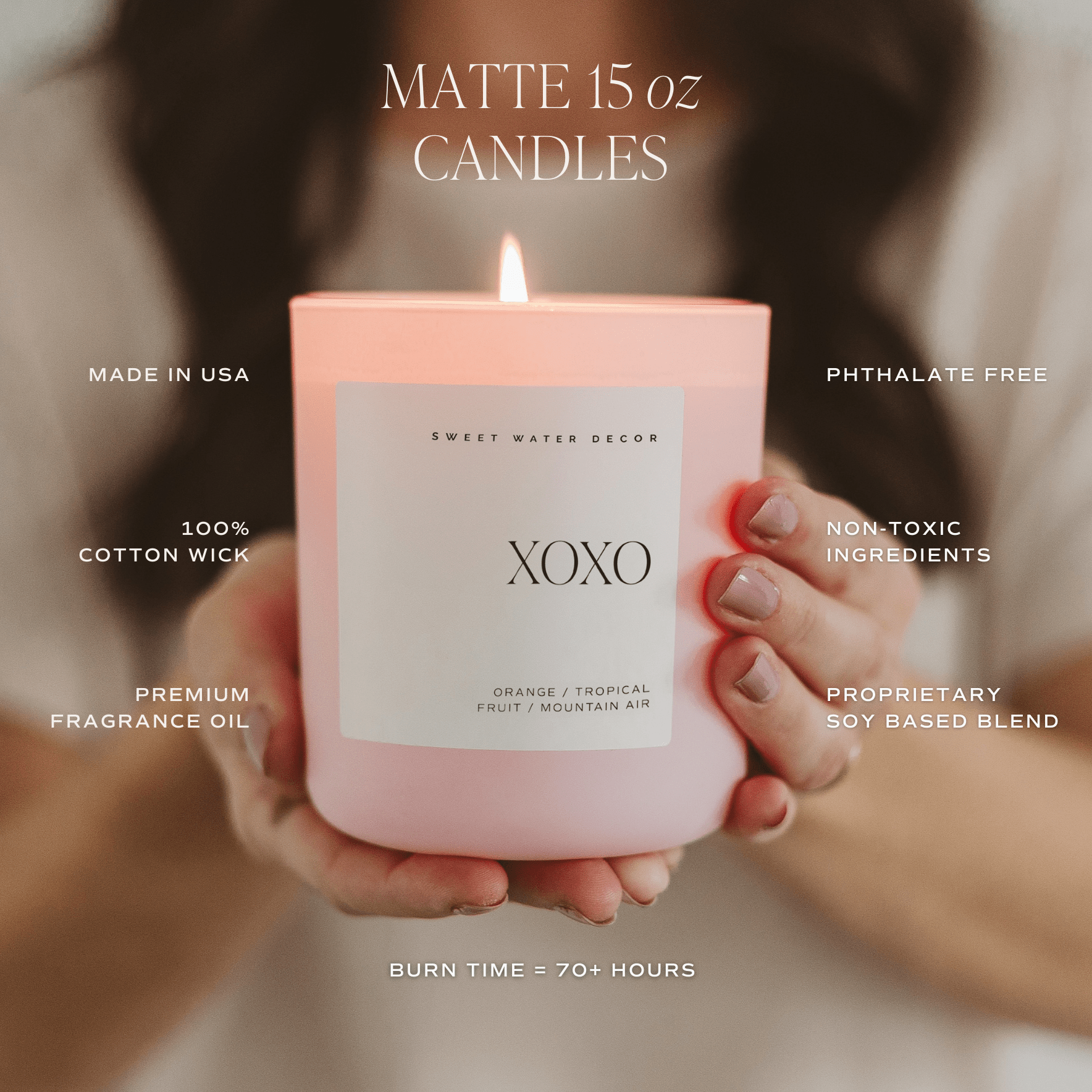 Pink candle labeled 'XOXO' held by hands with product details overlay