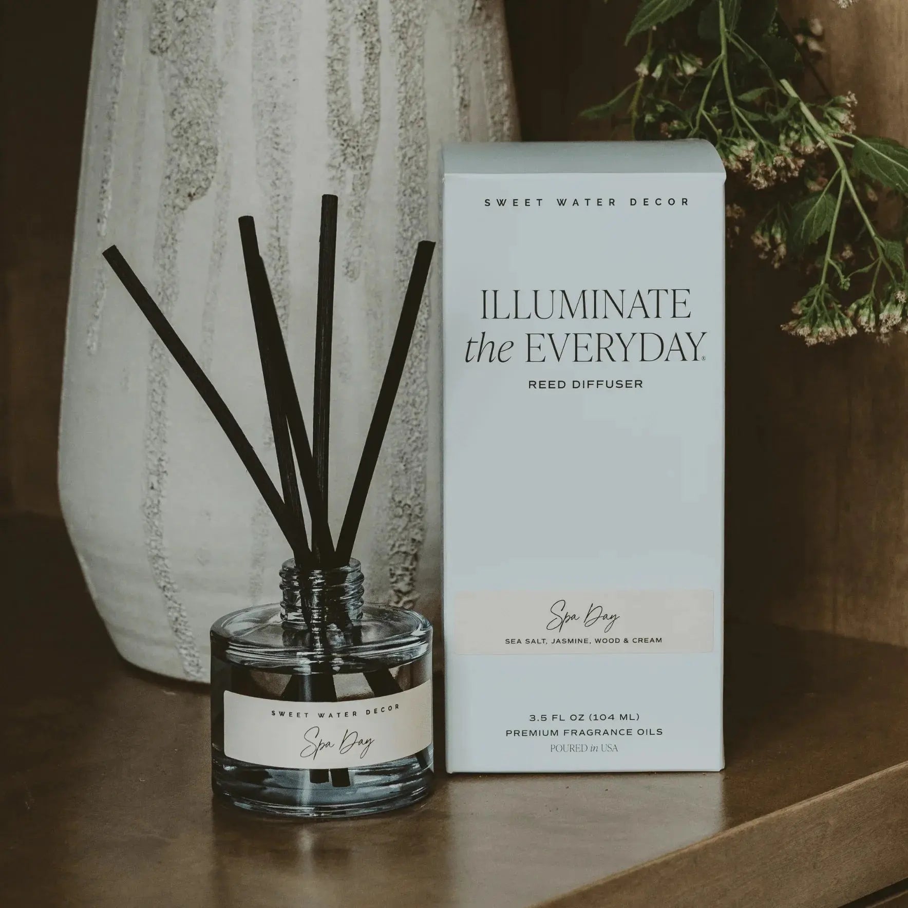 Spa Day reed diffuser with black reeds, glass bottle, and white box, cozy home decor scent