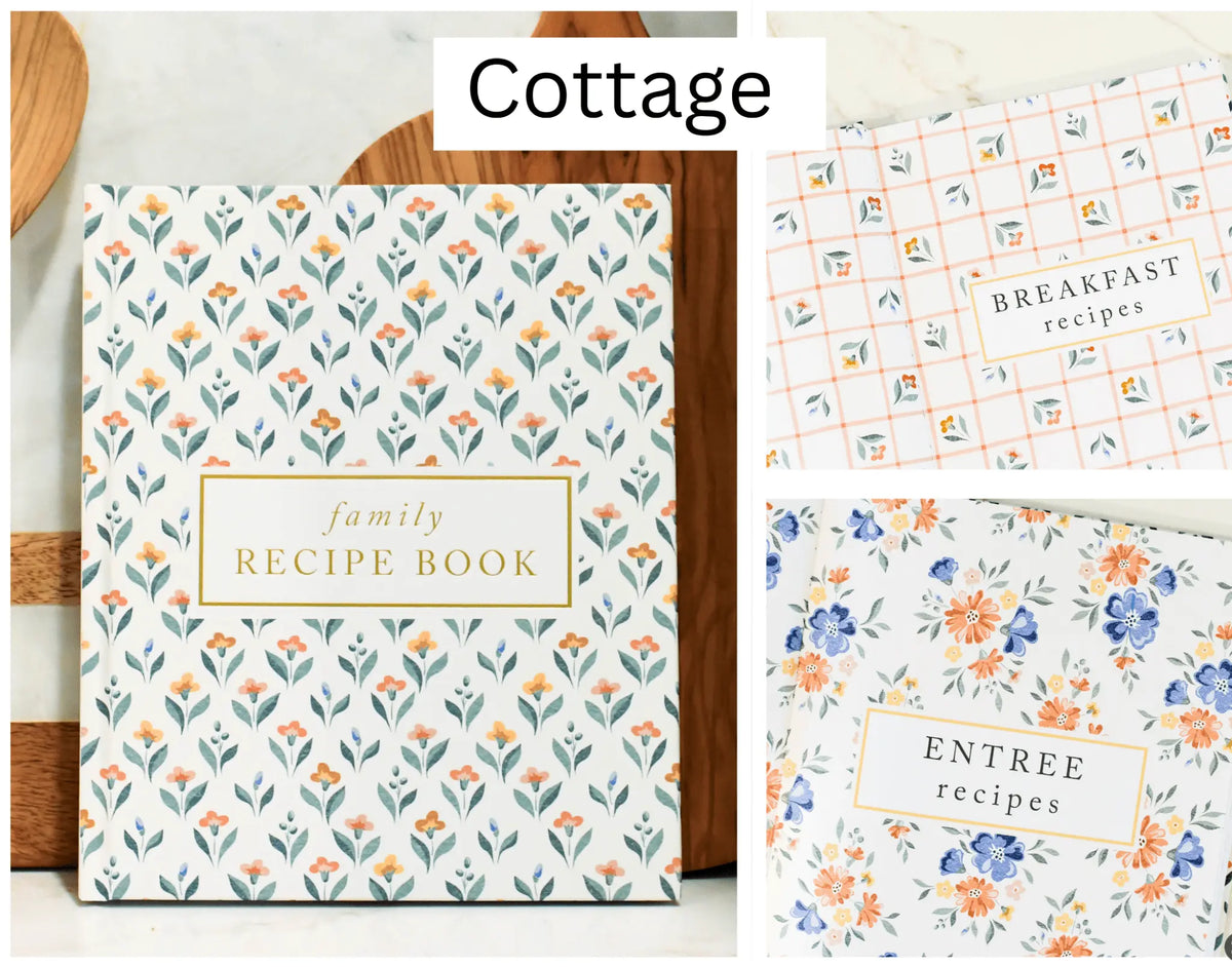 Floral-patterned family recipe book with section dividers on a wooden surface.