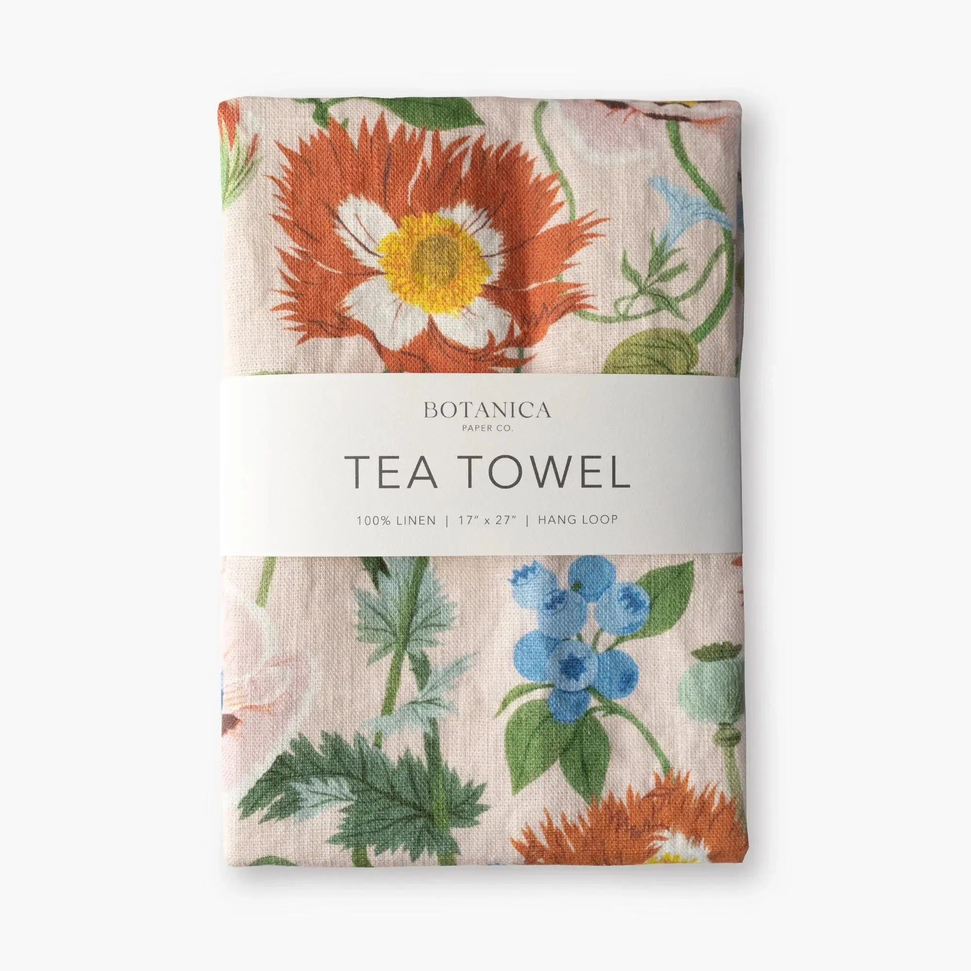 Floral patterned tea towel with Botanica branding on a white background