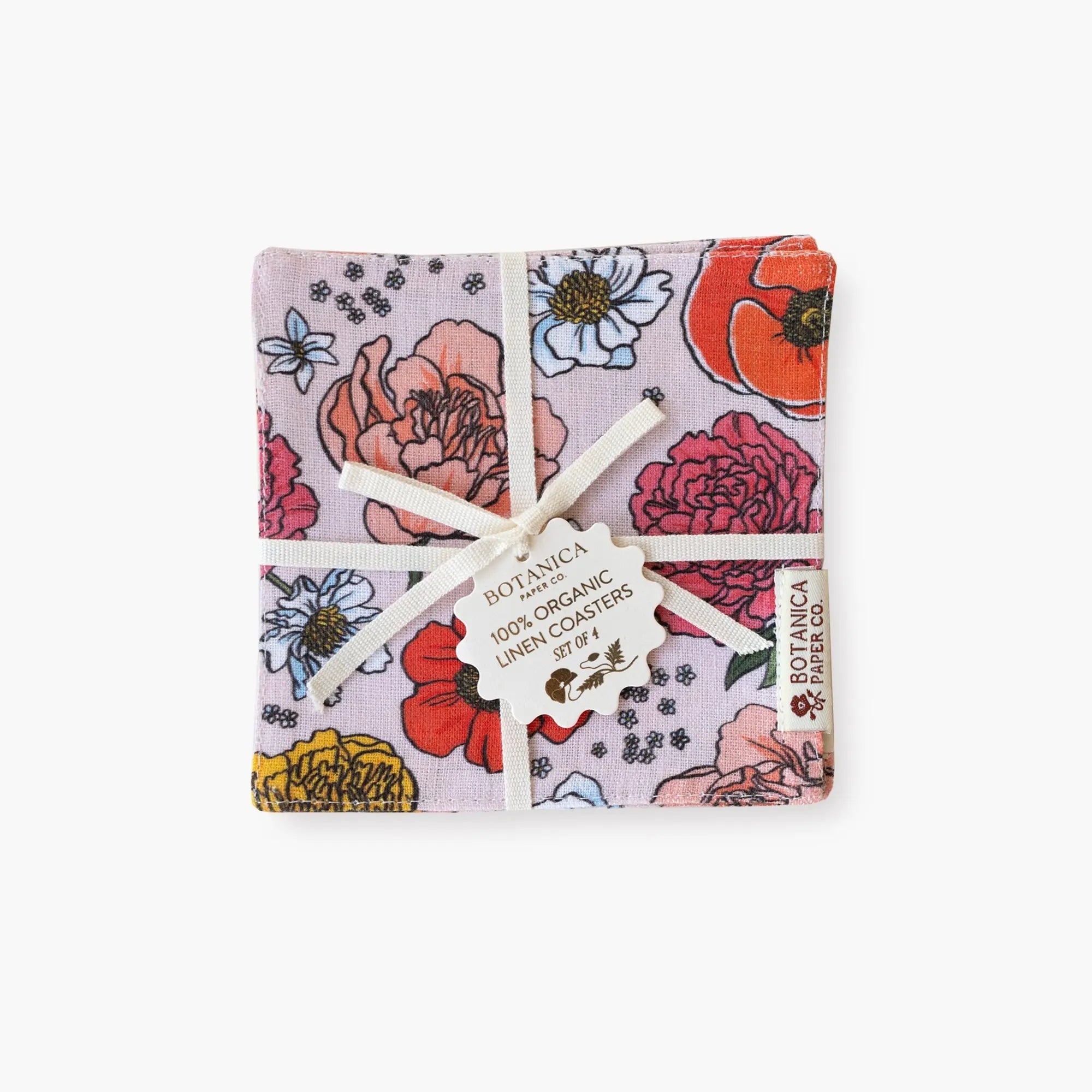 Pack of floral coasters with a visible brand tag on a white background