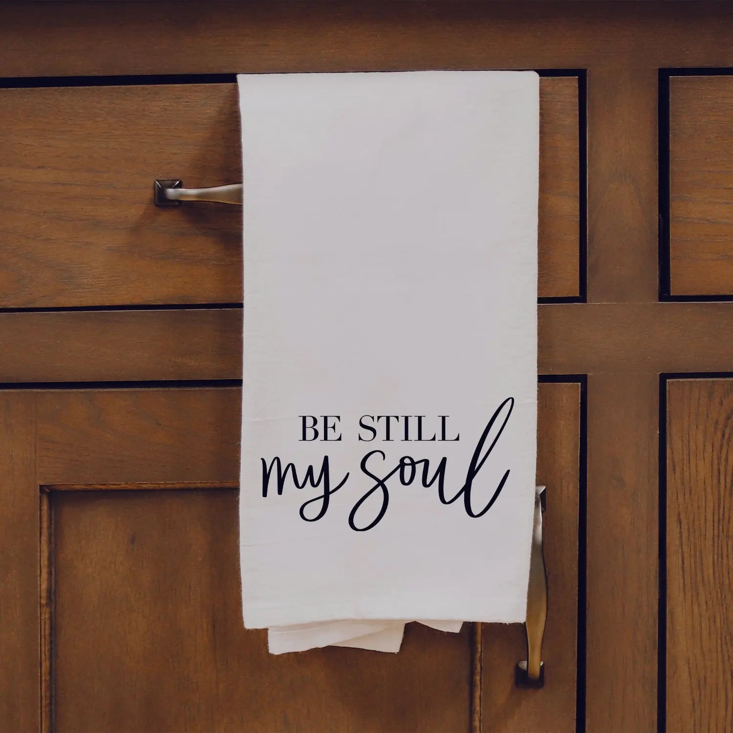 White kitchen towel with 'Be Still My Soul' quote, farmhouse decor for cozy home