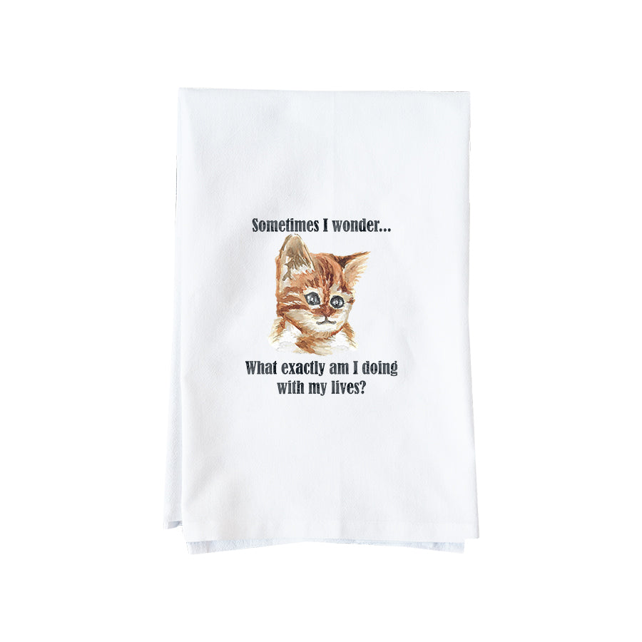 A white kitchen tea towel featuring a printed illustration of an orange tabby kitten with the text 'Sometimes I wonder.