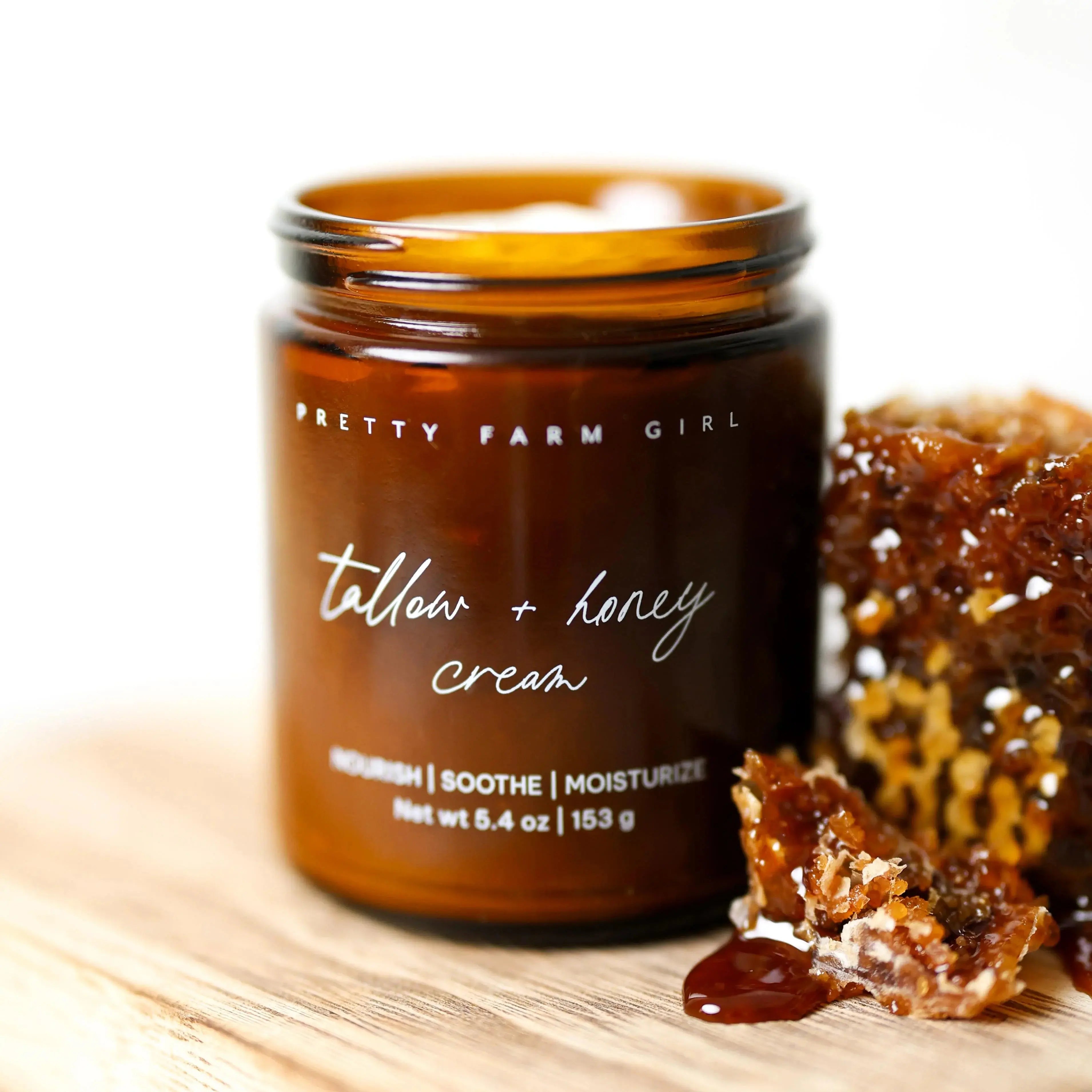 Tallow + Honey Cream in amber jar with honeycomb, nourishing farmhouse skincare