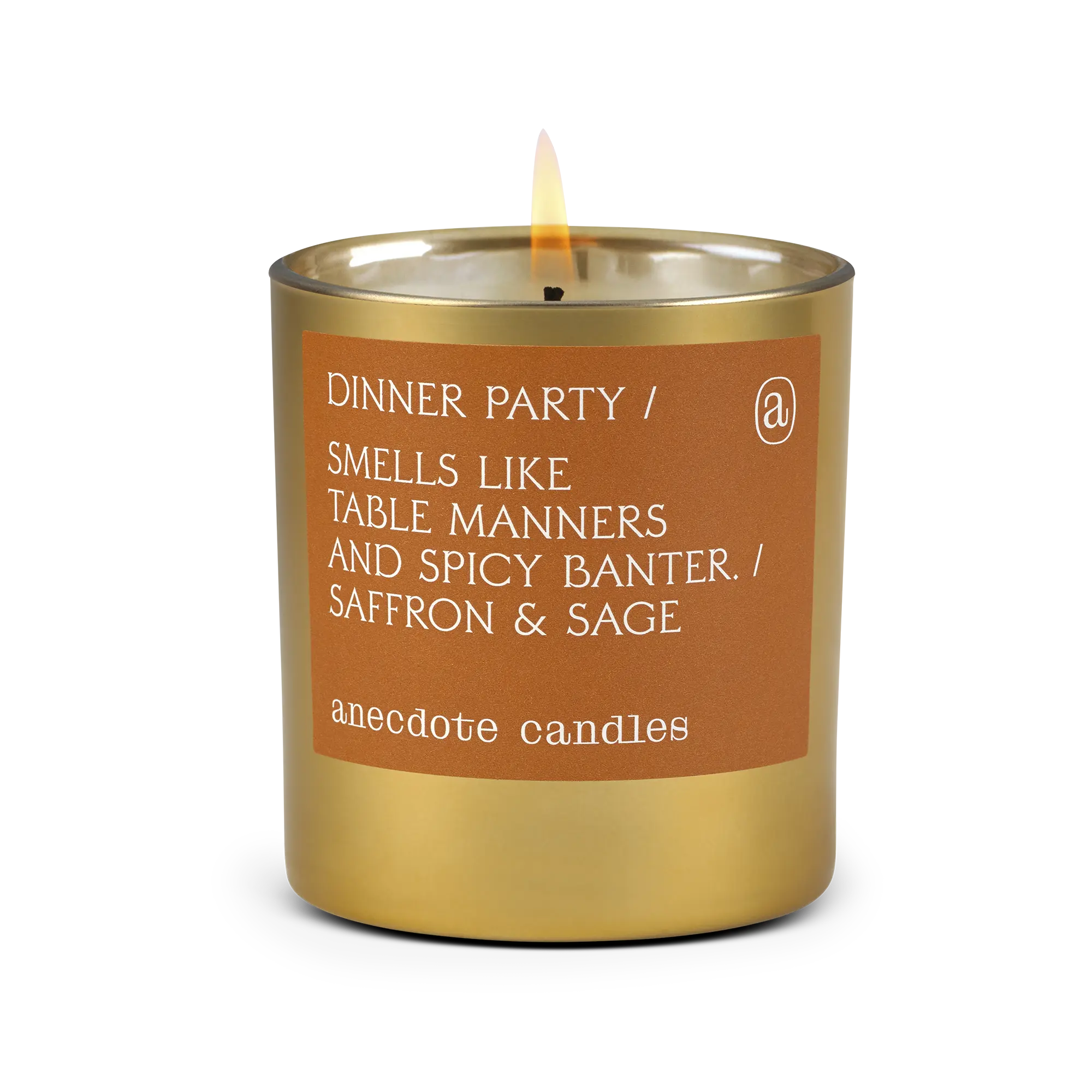 Gold candle with a brown label on a white background