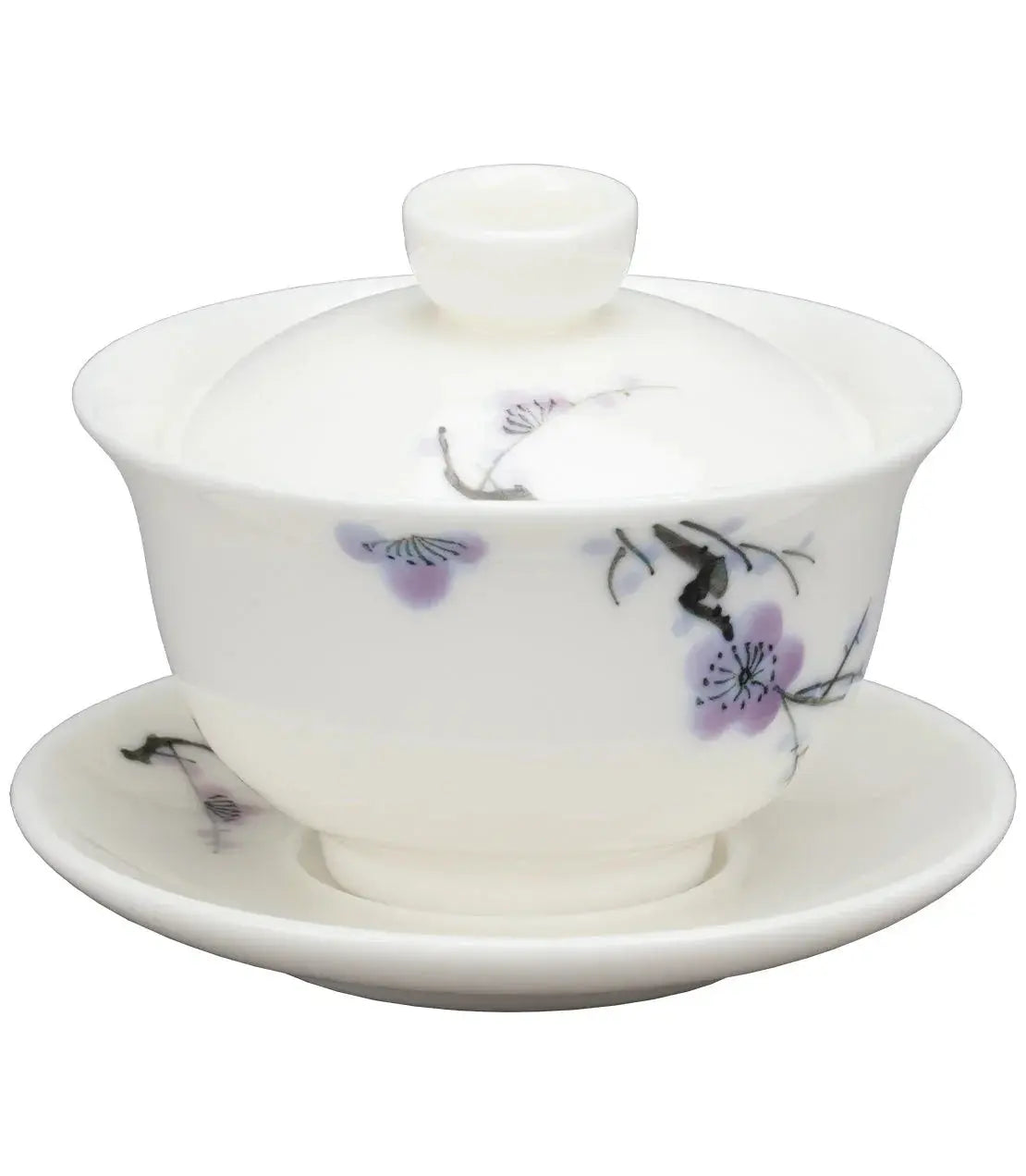 White porcelain tea set with purple floral design, cozy farmhouse decor