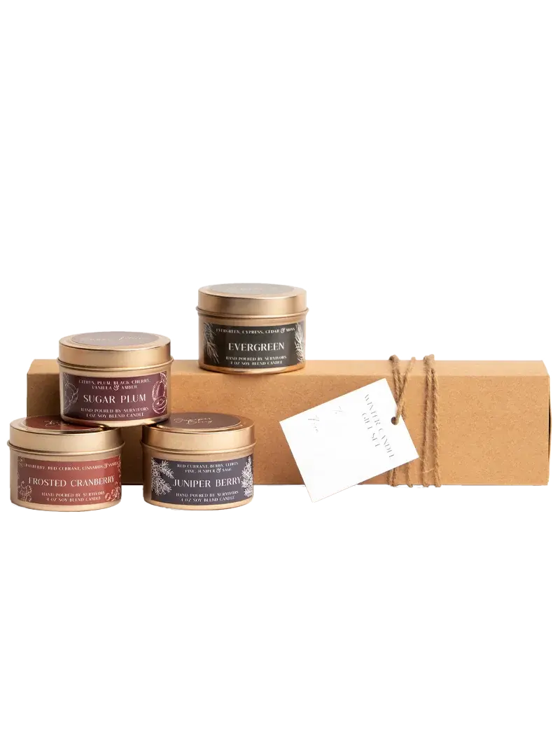 Winter candle gift set with cozy scents like Sugar Plum, Evergreen, Frosted Cranberry, and Juniper Berry in rustic tins