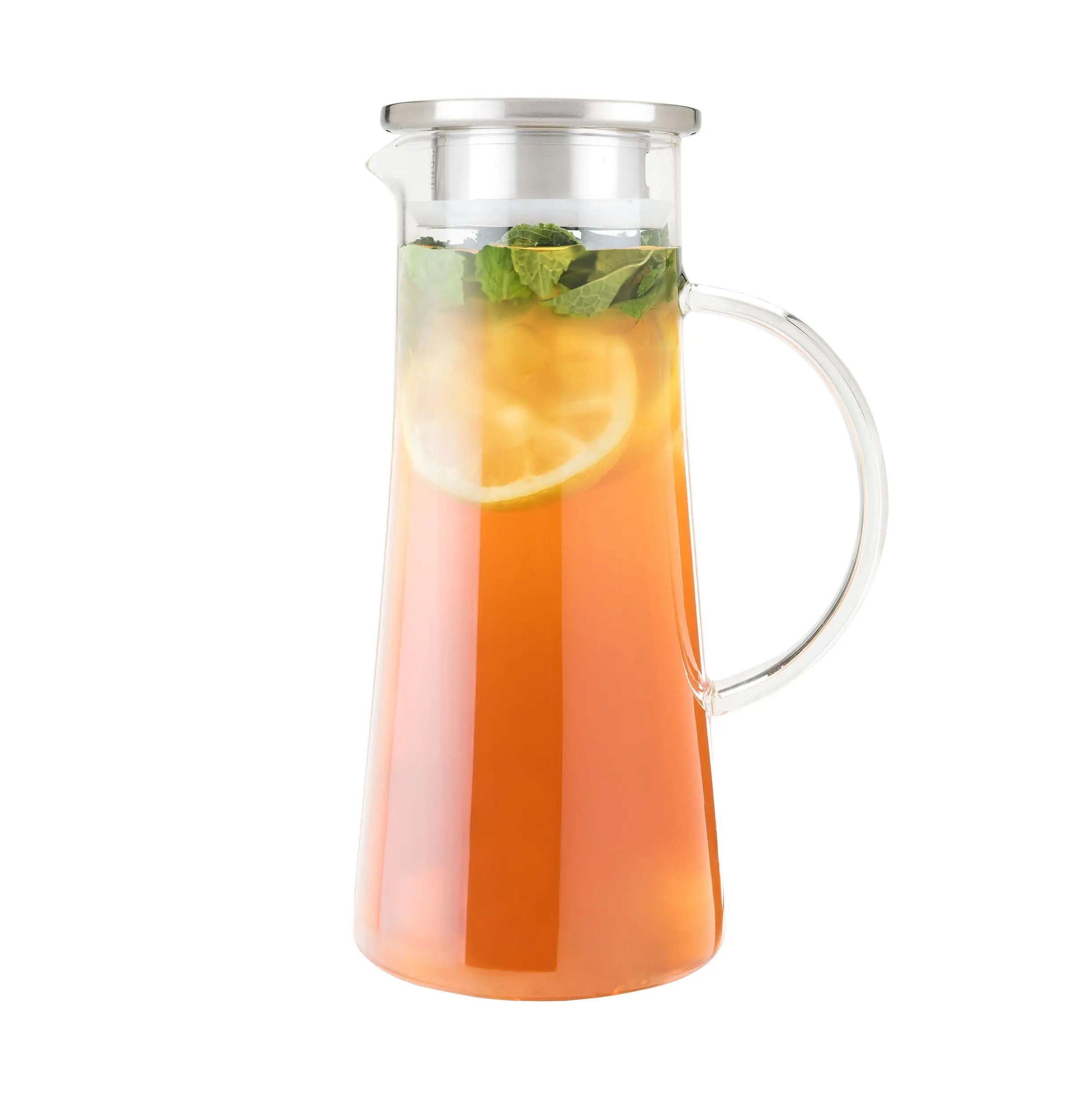Clear glass pitcher filled with iced tea, lemon slices, and mint leaves on a white background