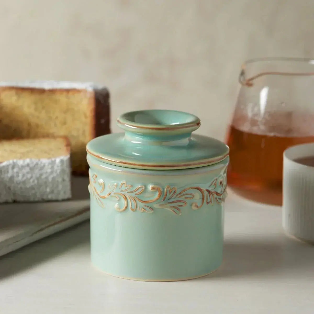 Mint green ceramic canister with gold leaf design, farmhouse kitchen decor, cozy cottage style