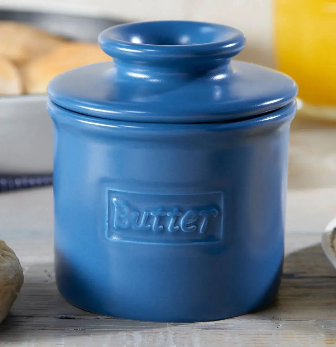 Blue ceramic butter crock with embossed label, farmhouse kitchen decor