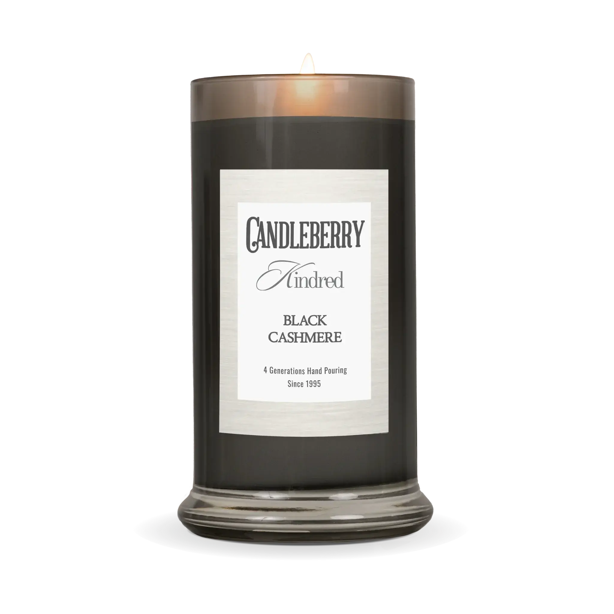 Black Cashmere scented candle in smoky glass jar, lit flame, farmhouse home decor