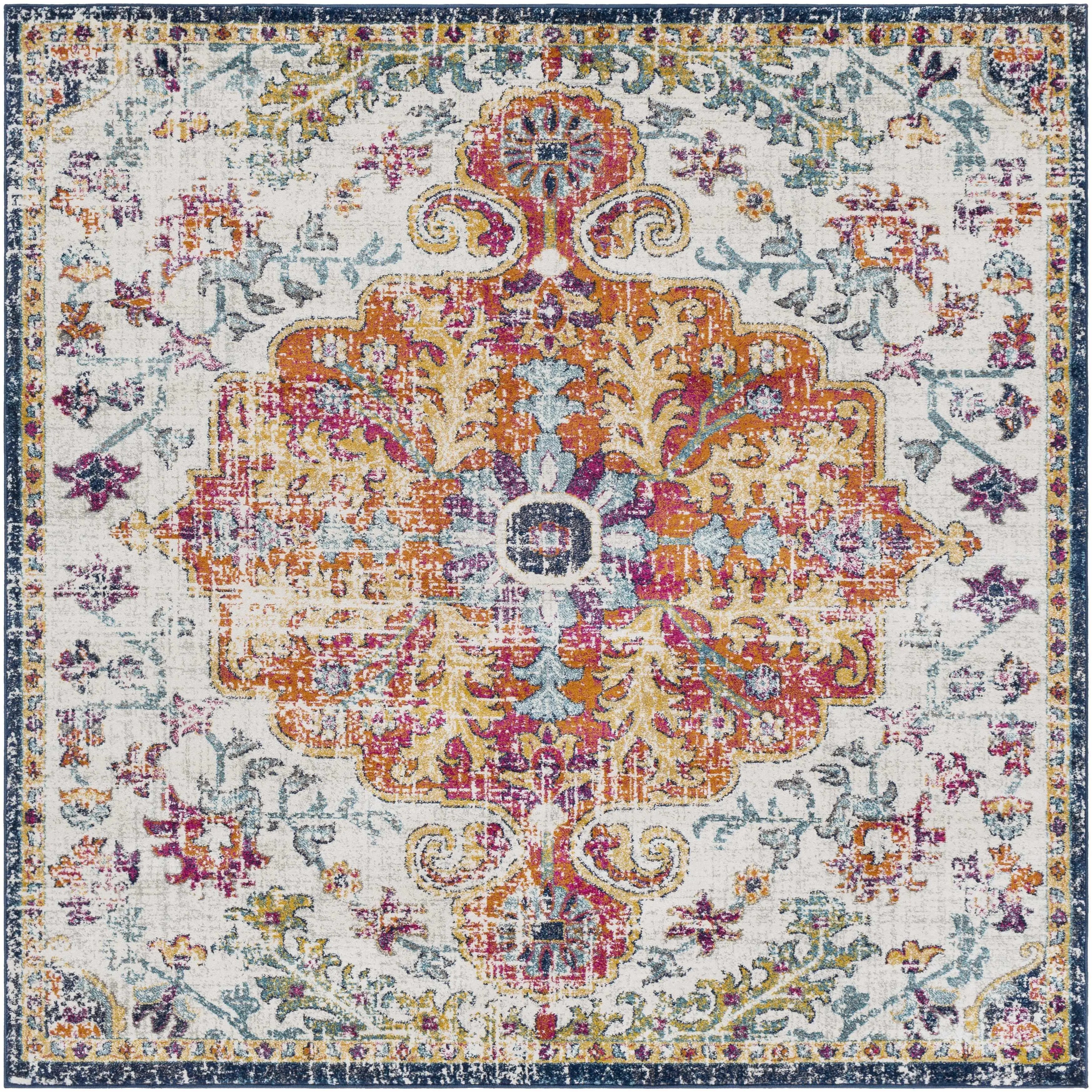 Vintage-inspired area rug with floral medallion design in warm tones, perfect for cozy farmhouse decor.