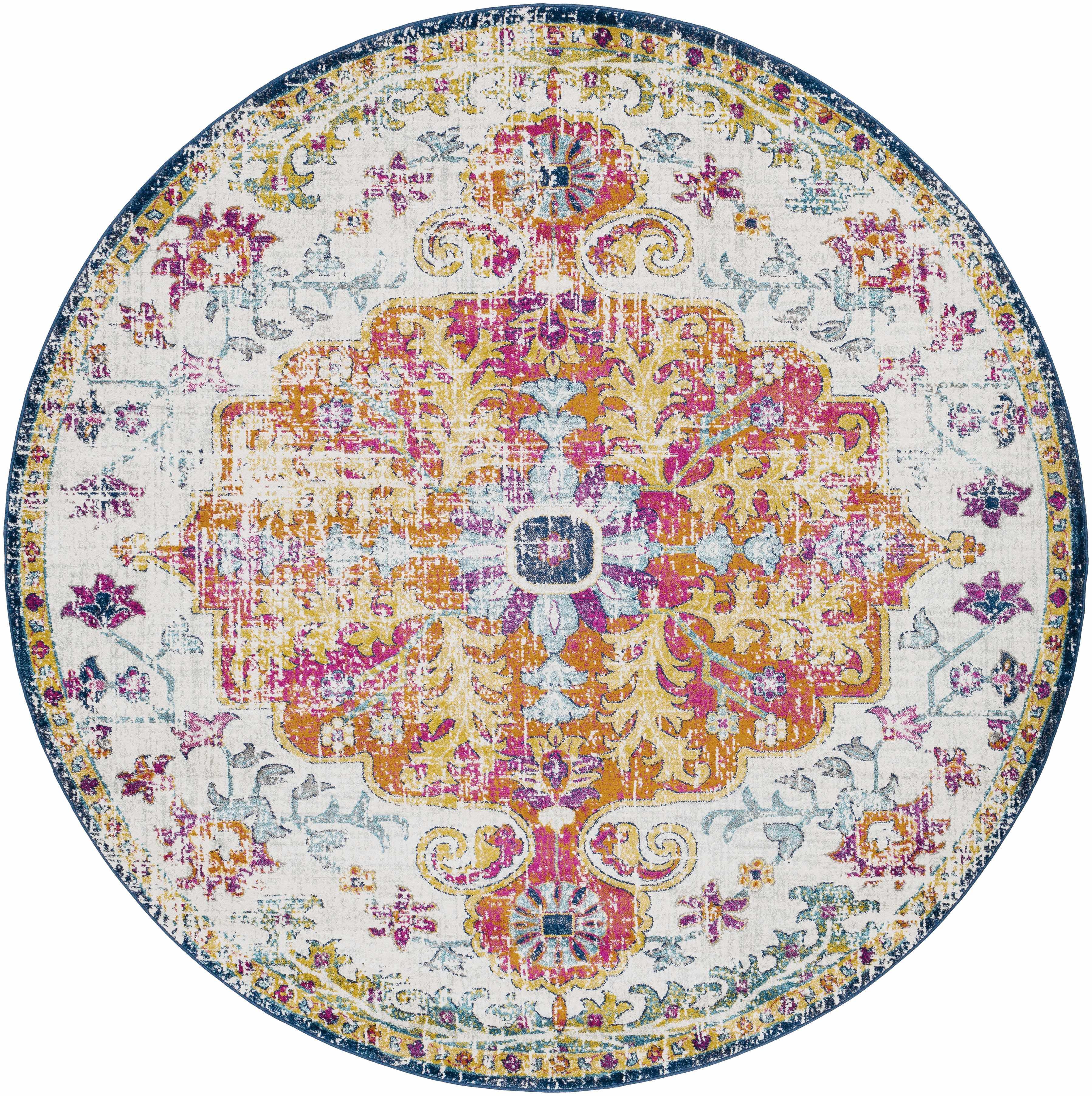 Round vintage-style area rug with floral medallion design in pink, gold, and blue tones
