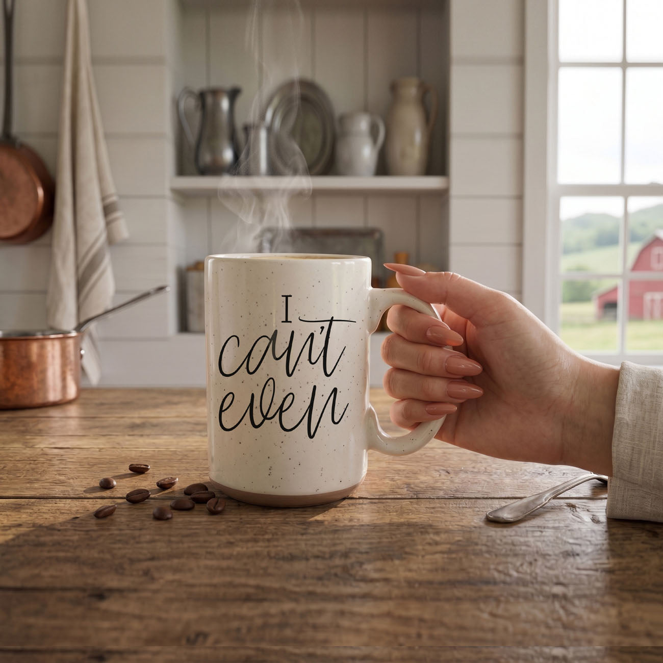 Person holding a mug with 'I can't even' text in a kitchen setting