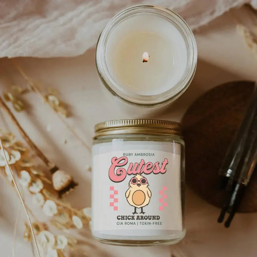 Candle in a jar with a decorative label on a soft background
