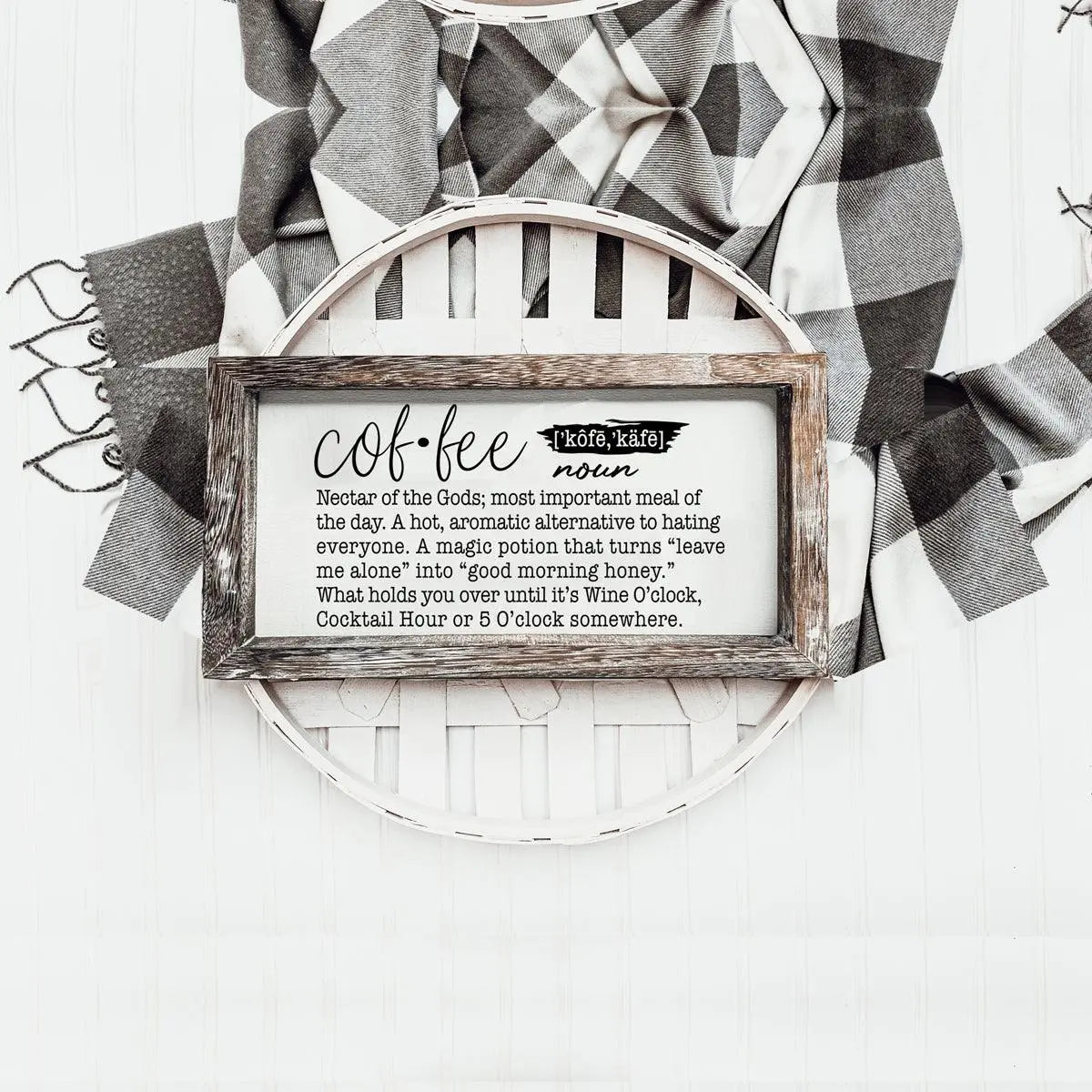 Decorative sign with coffee definition on a white background