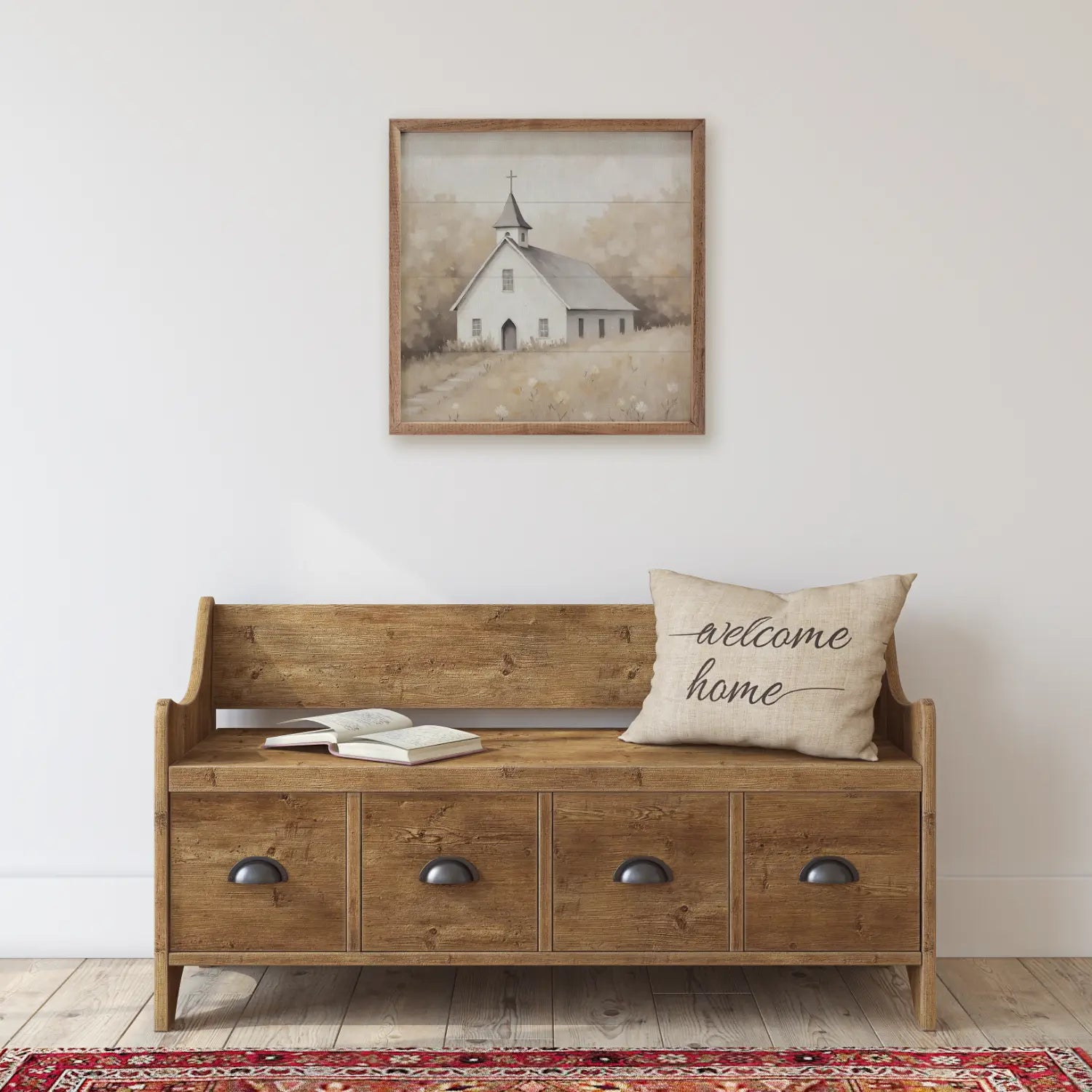 Wooden bench with drawers in a room with a framed picture of a church on the wall.