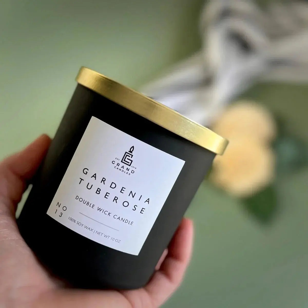 Gardenia Tuberose double wick soy candle in matte black jar with gold lid, cozy home decor