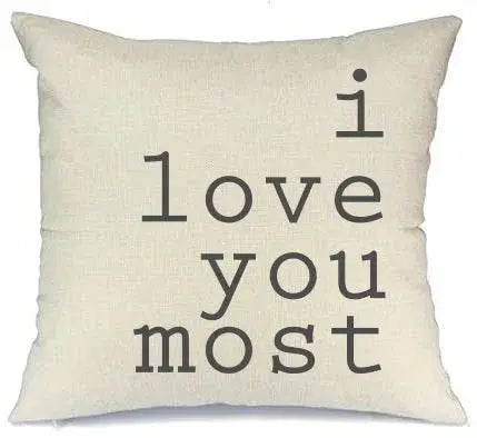 Cozy farmhouse pillow with 'i love you most' text, perfect for cottage-style home decor and thoughtful gifts