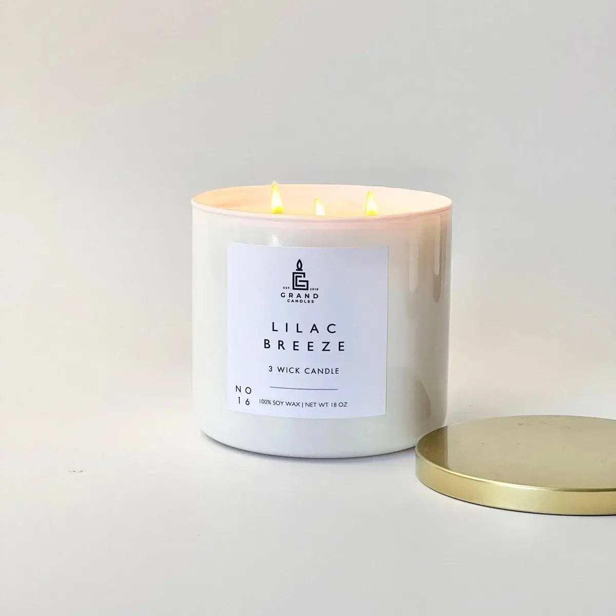 Lilac Breeze 3-wick soy candle in white jar with gold lid, cozy home decor essential