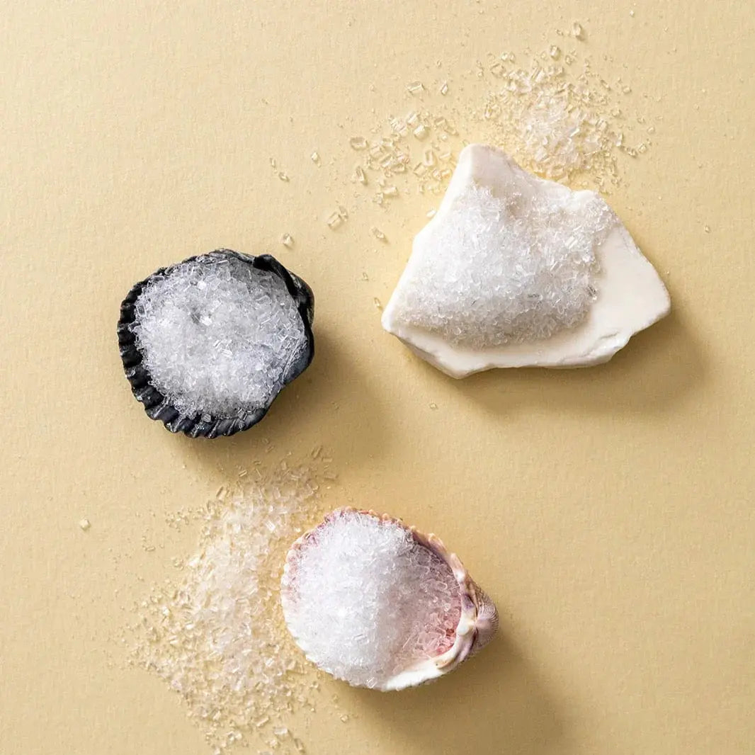 Cozy farmhouse bath salts in decorative seashells, perfect for relaxing spa nights and cottage-style home decor