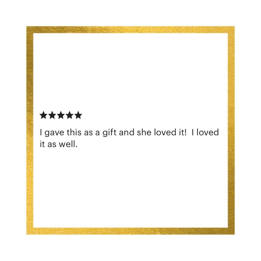 A square white card or print with a textured gold border, featuring a five-star rating graphic and the quote, 'I gave this as a gift and she loved it! I loved it as well.' in black text.