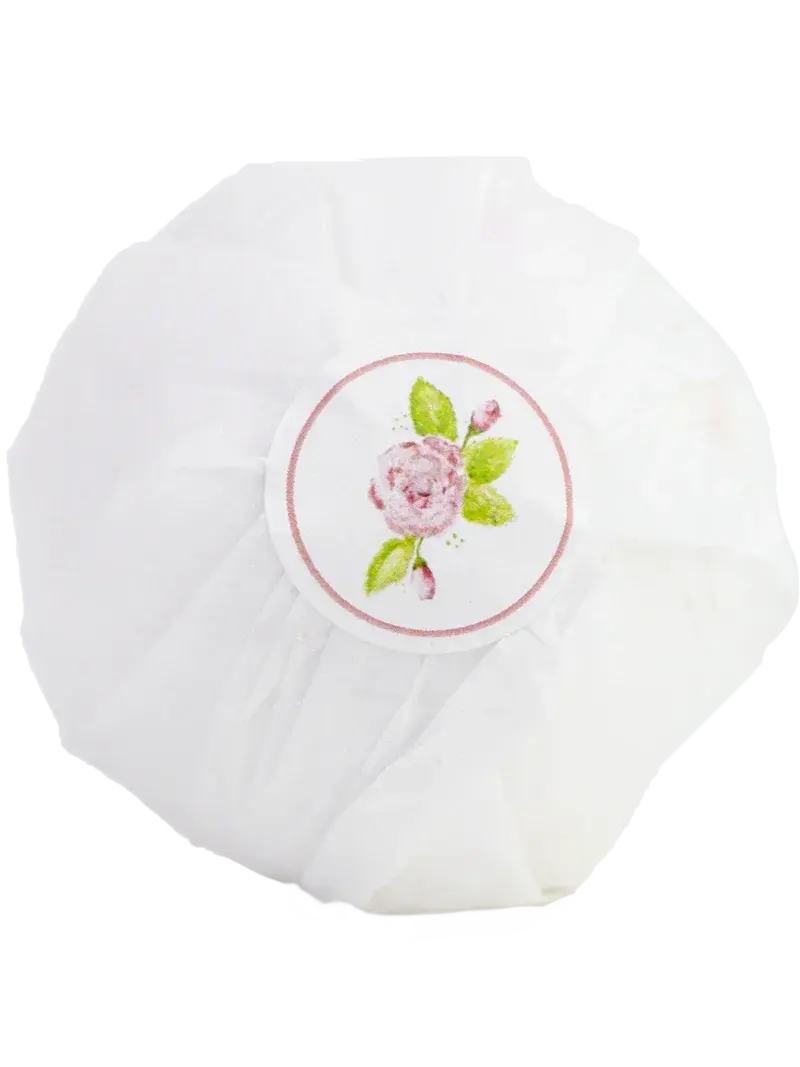 White shower cap with pink rose design, cozy farmhouse bath essential