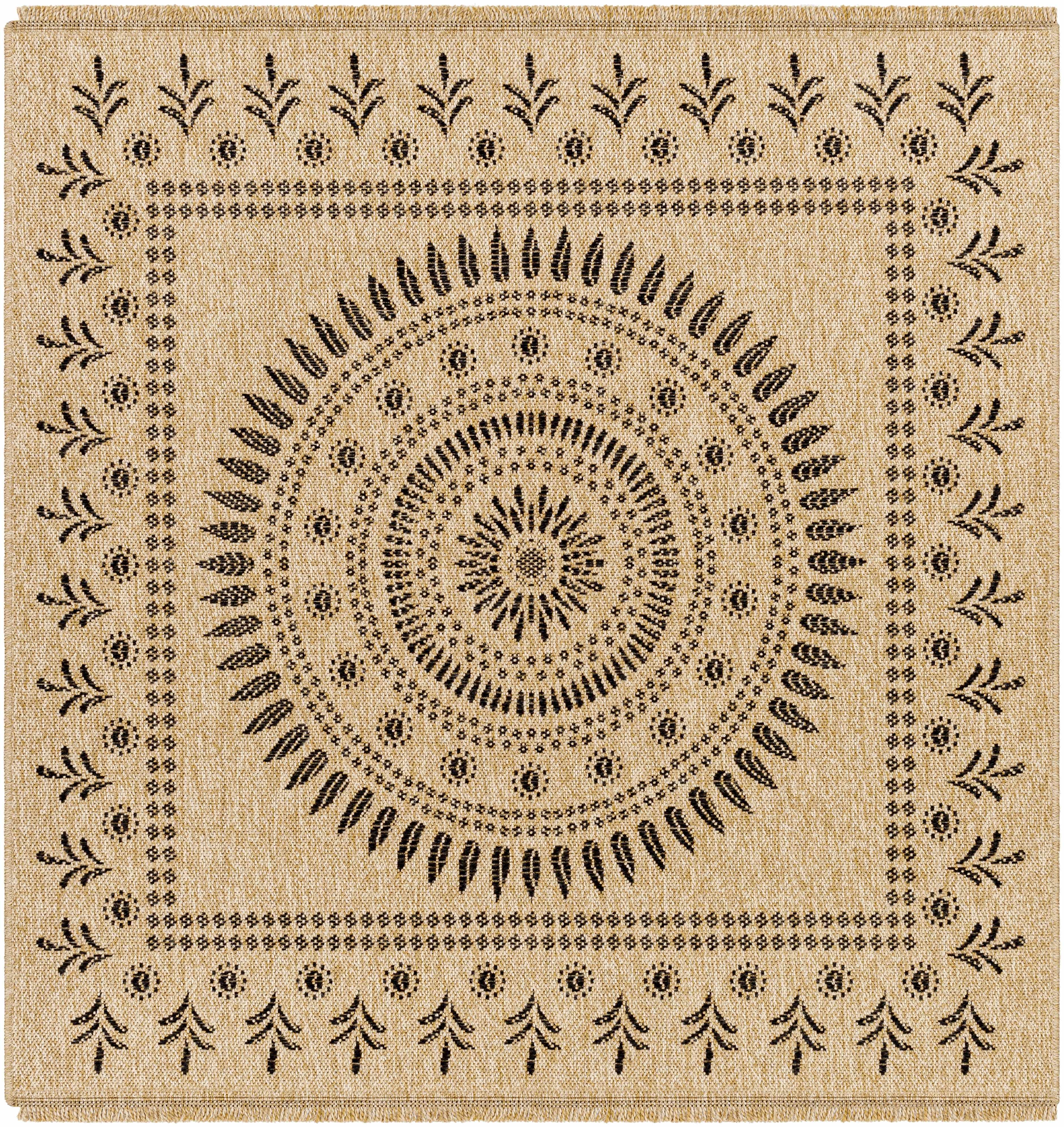 Beige woven rug with black geometric and floral patterns, farmhouse style home decor