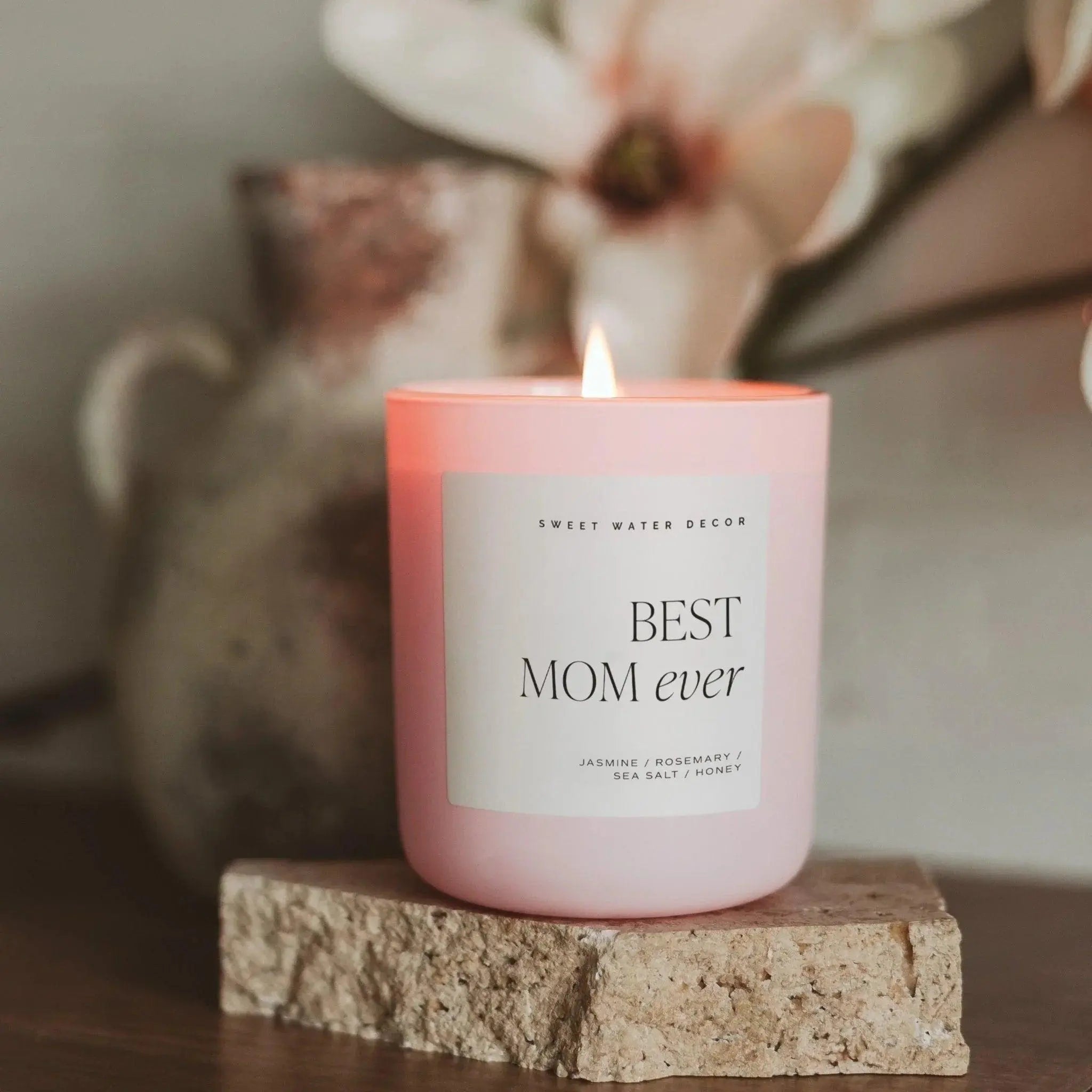 Pink 'Best Mom Ever' candle with jasmine rosemary scent, cozy farmhouse decor