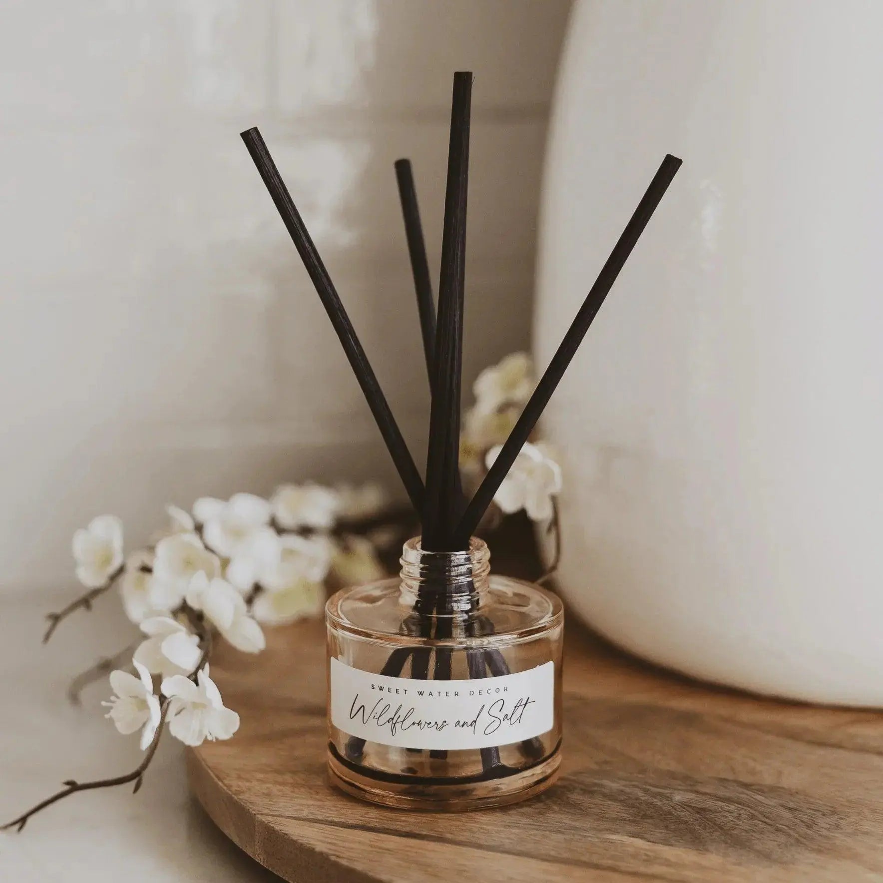 Wildflowers and Salt reed diffuser with black sticks, cozy farmhouse decor on wood tray