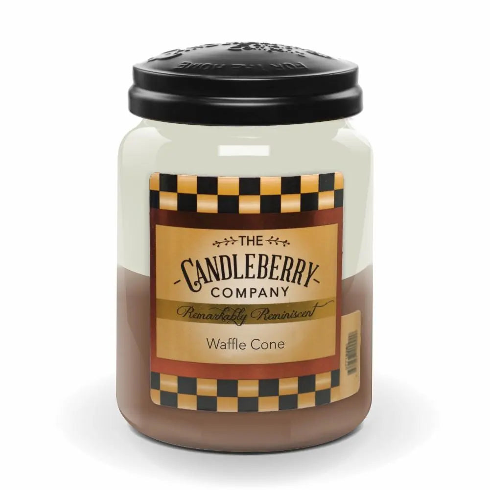 Candle with a label from The Candleberry Company on a white background