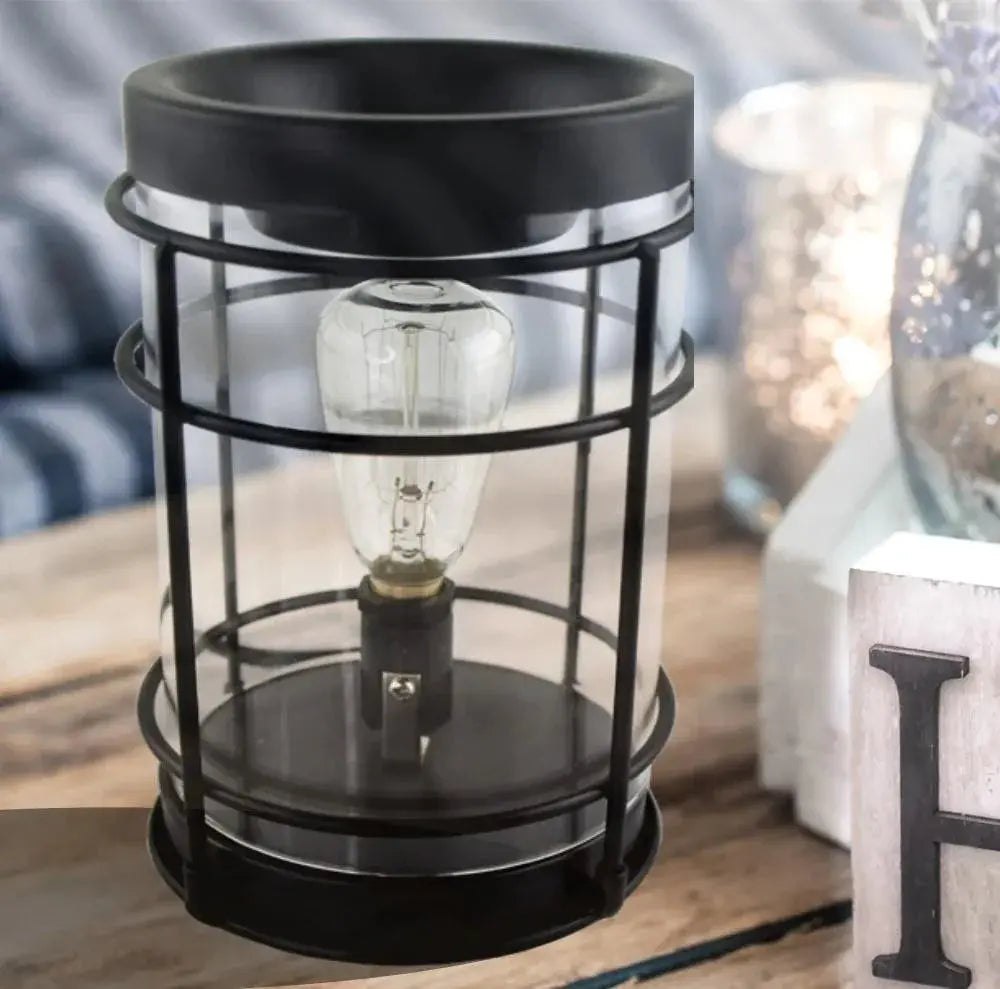 Rustic black wire lantern with vintage bulb for cozy farmhouse decor