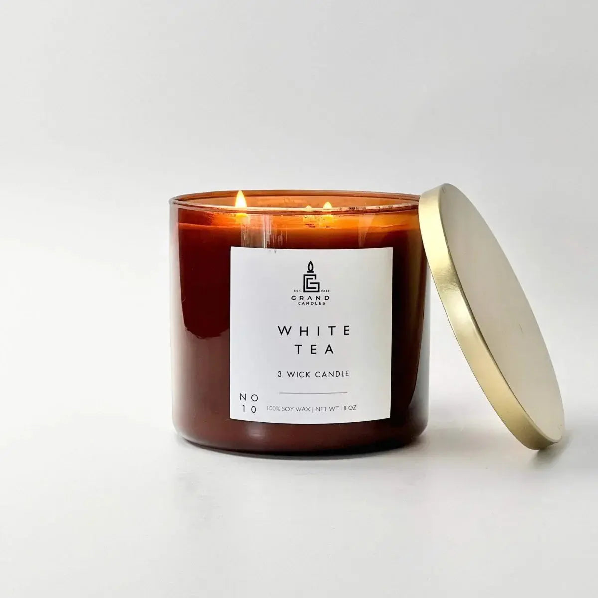 White Tea 3-wick soy candle in amber glass with gold lid, cozy home decor