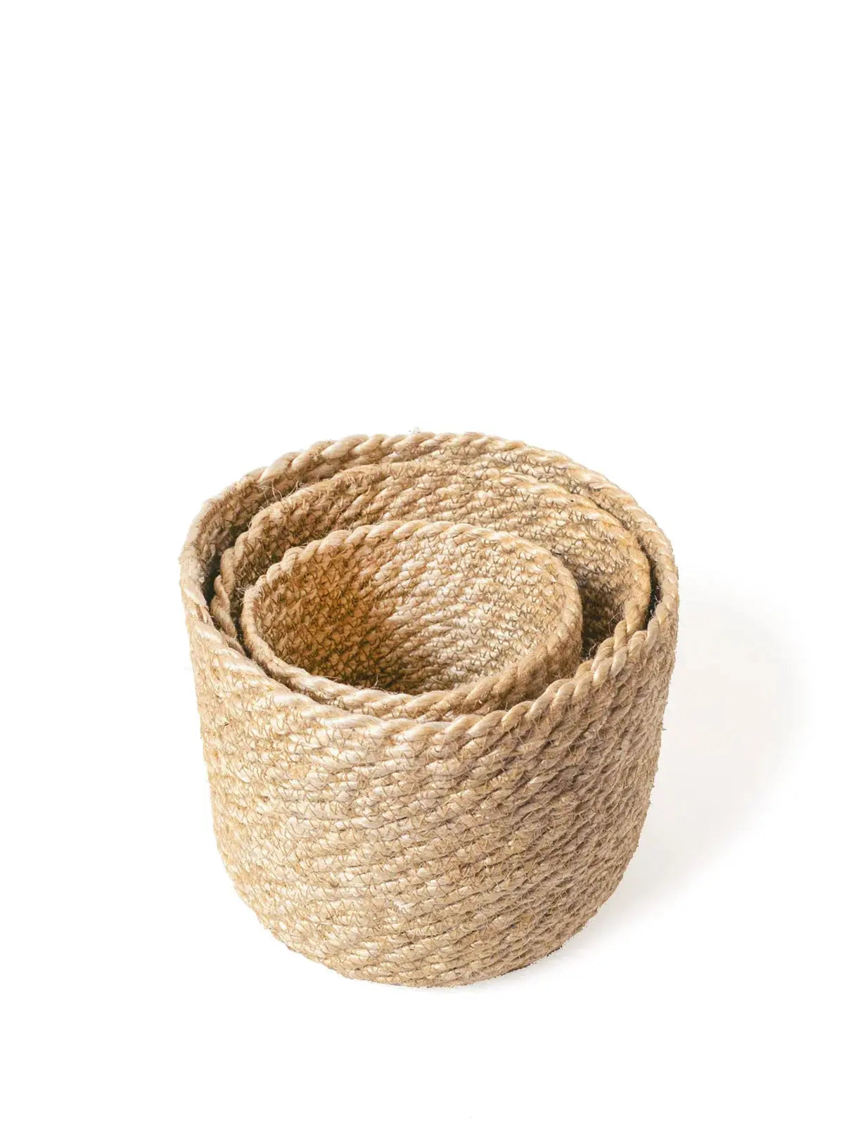 Set of three nested jute rope baskets for farmhouse or cottage style home decor storage