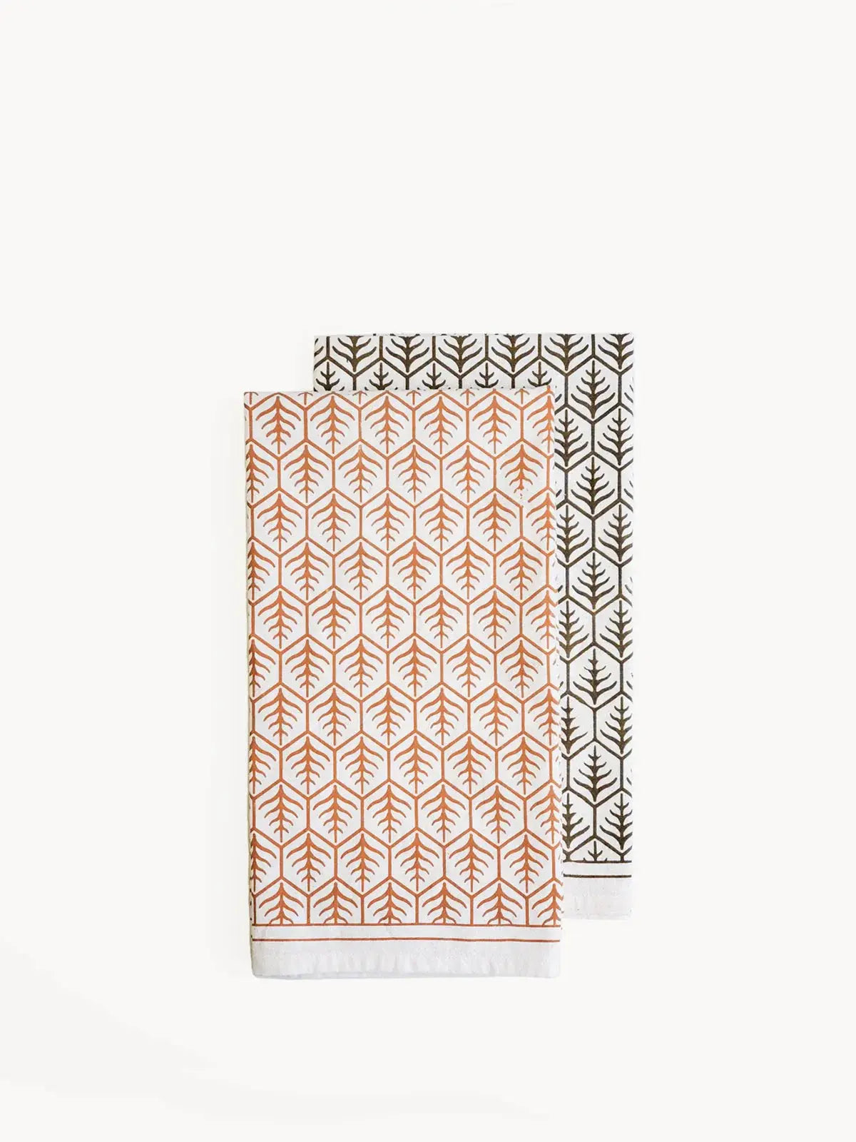 Set of two farmhouse-style kitchen towels with geometric leaf patterns in terracotta and brown, perfect for cozy home decor.