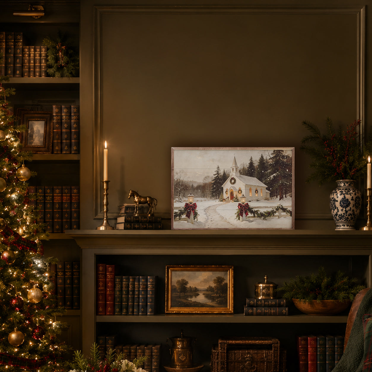 Decorative shelf with Christmas tree, books, and framed artwork in a warm, cozy setting.