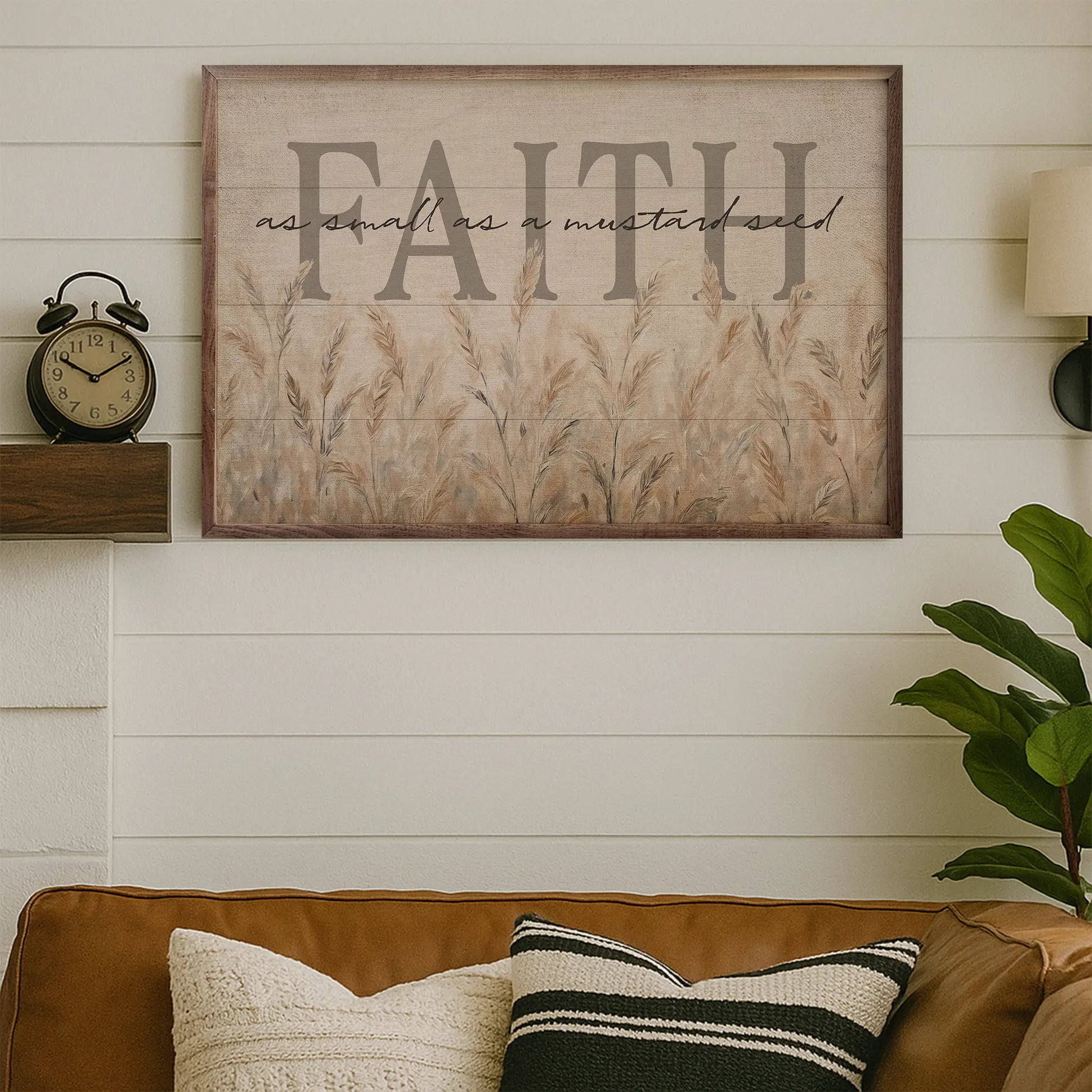 Decorative wall art with 'FAITH' text above a brown sofa with patterned cushions.