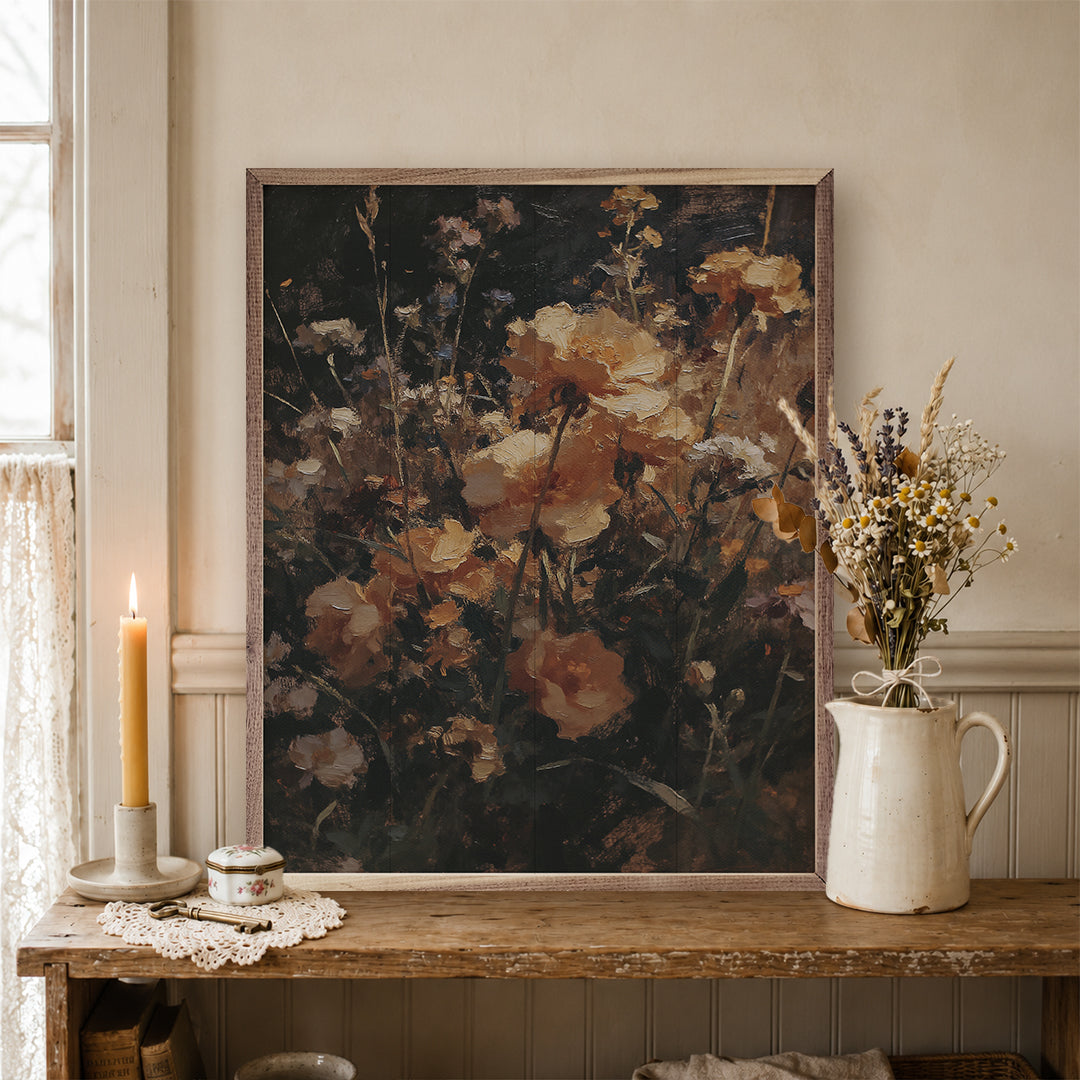 Floral painting on a wooden console table with a candle and pitcher.