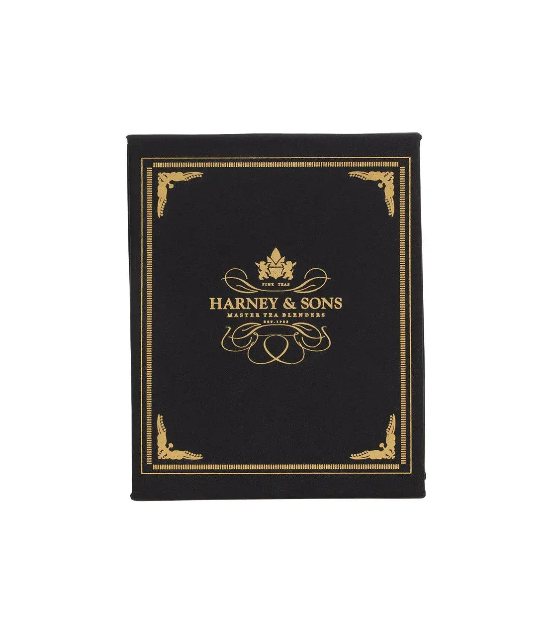 Elegant black Harney & Sons tea box with gold ornate detailing, perfect for cozy home decor and thoughtful gifts.