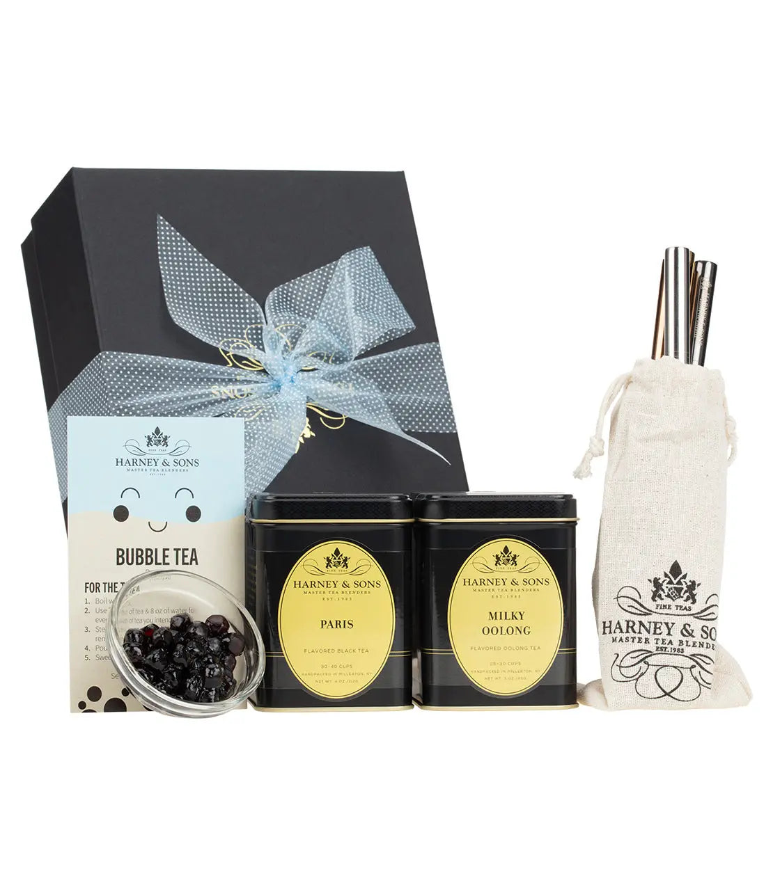 Harney & Sons tea gift set with Paris & Milky Oolong tins, bubble tea pearls, straws, and ribbon-wrapped box