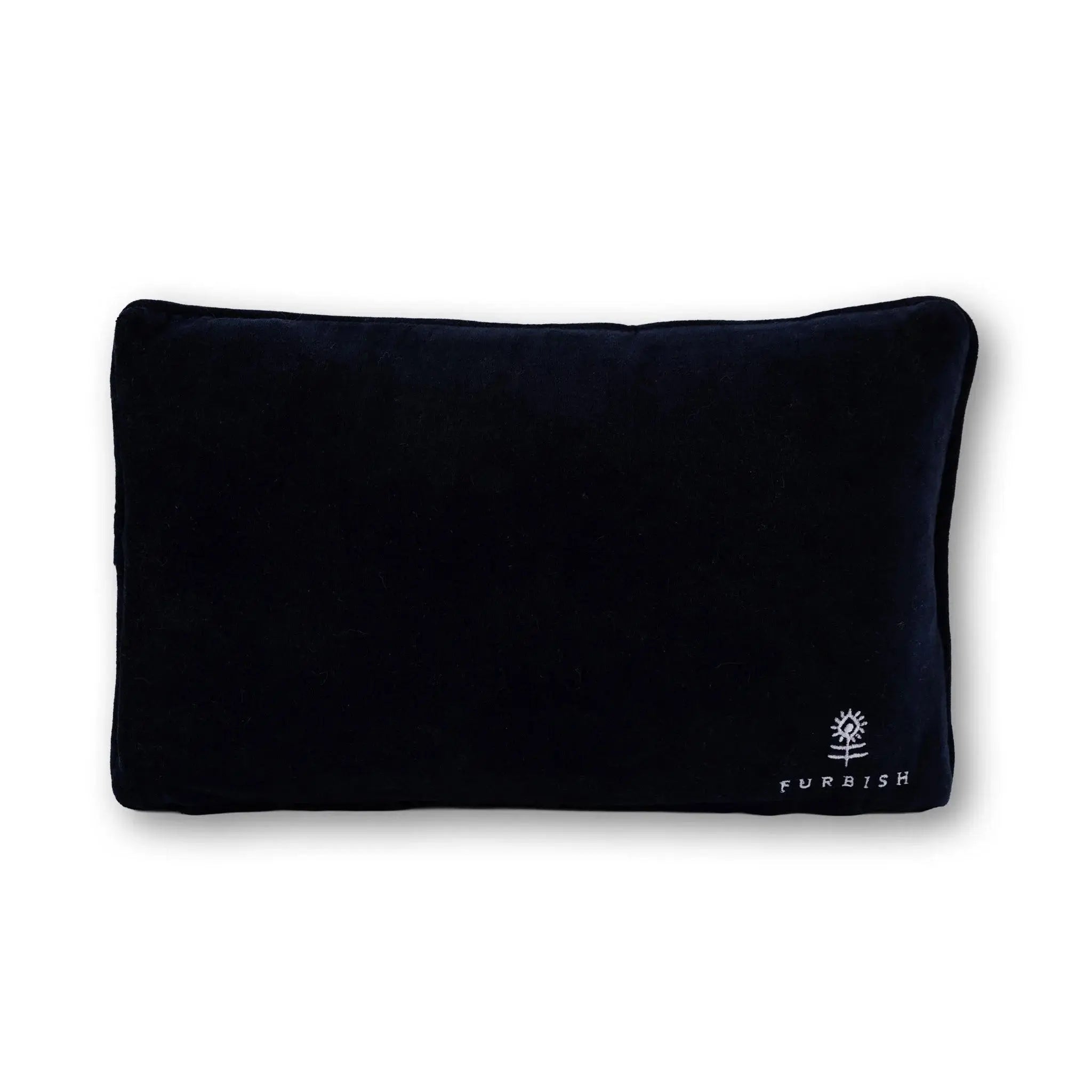 backside of a black pillow with the Furbish logo