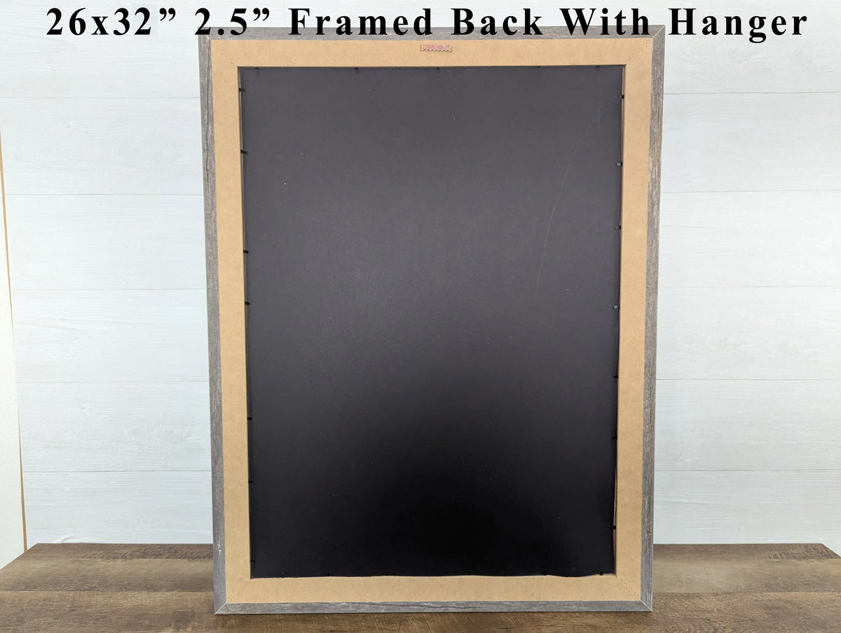Black chalkboard with wooden frame and hanger on a white background
