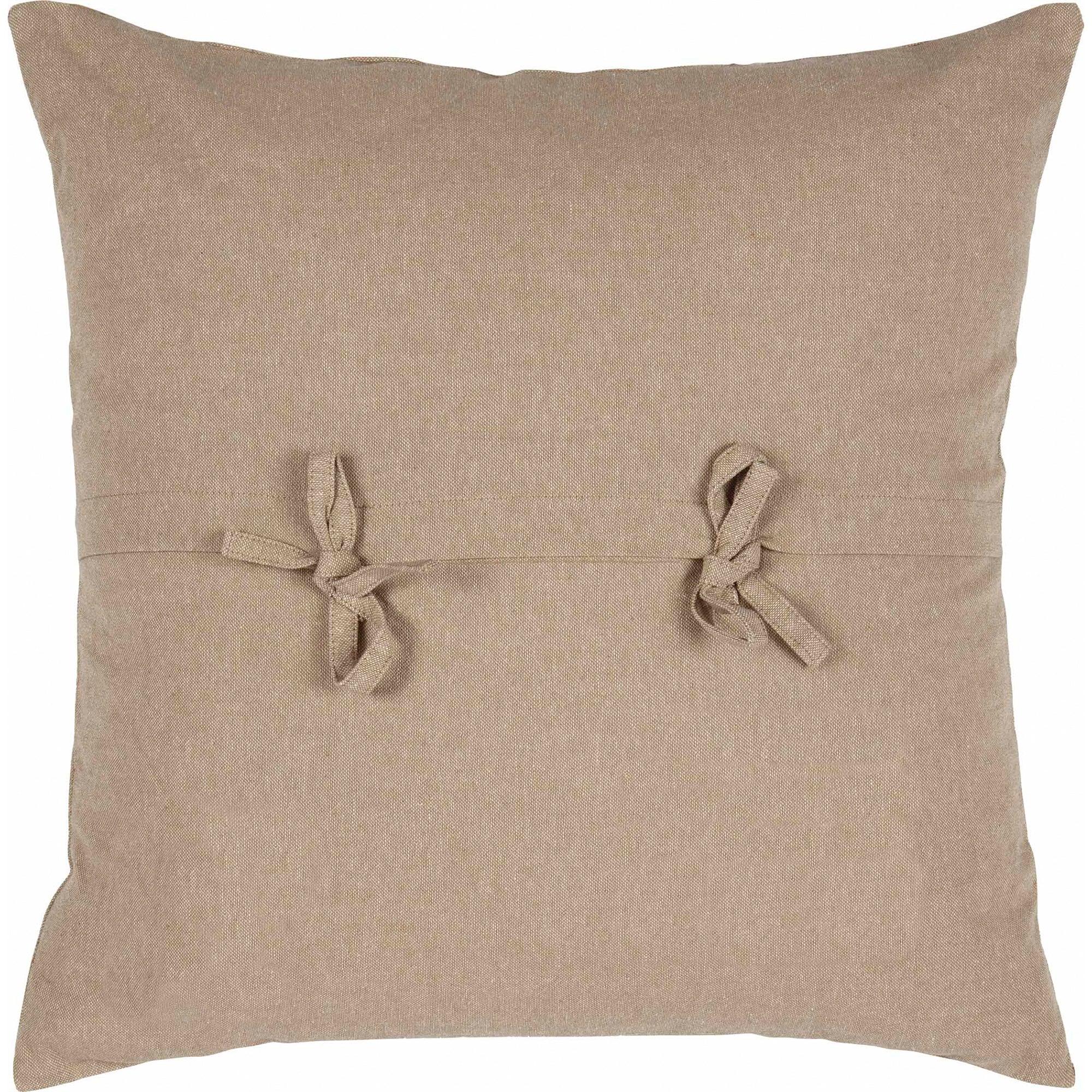 Beige farmhouse throw pillow with tied fabric knots, cozy cottage decor accent