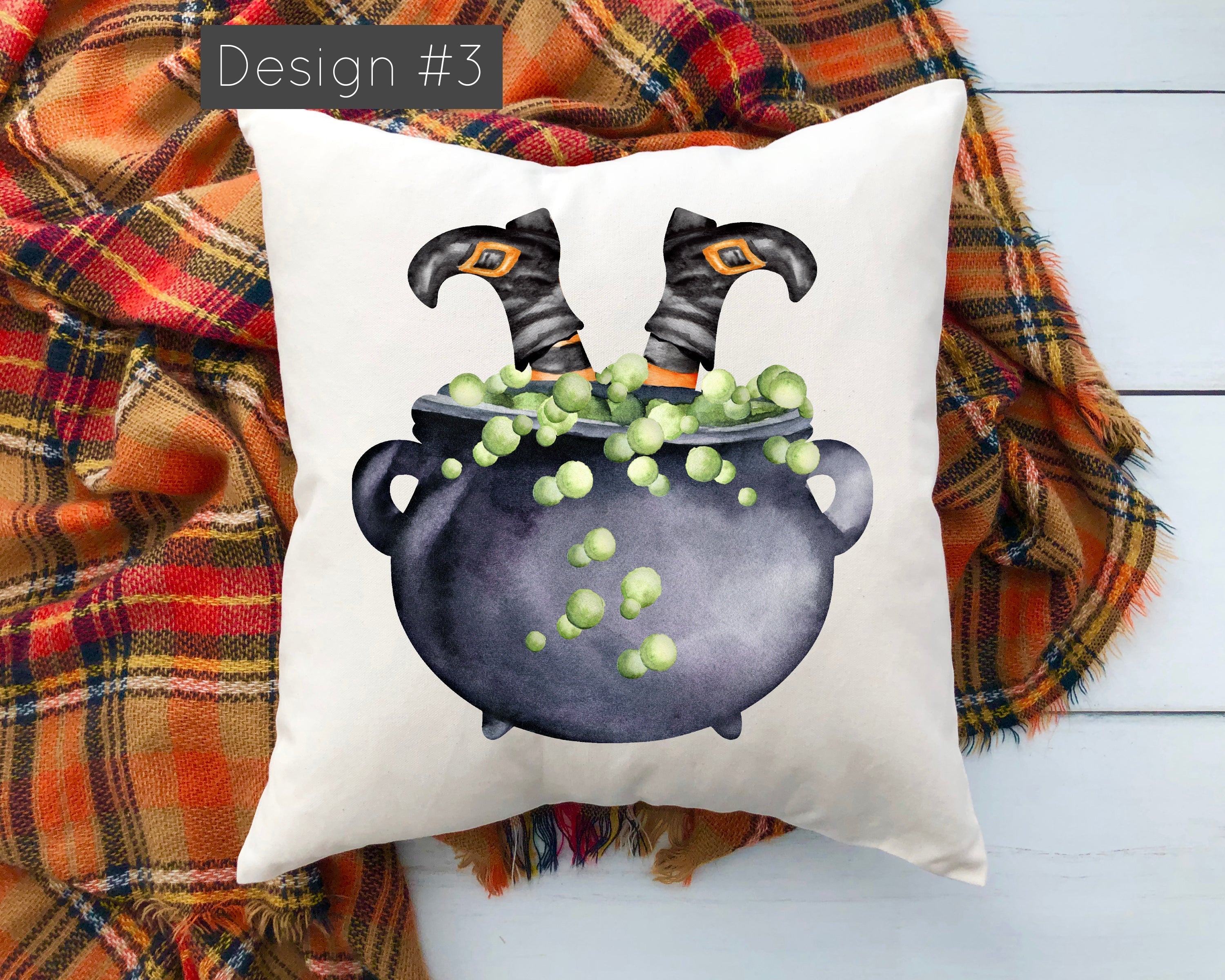 Pillow with Halloween design of a cauldron and witch's boots on a plaid fabric background